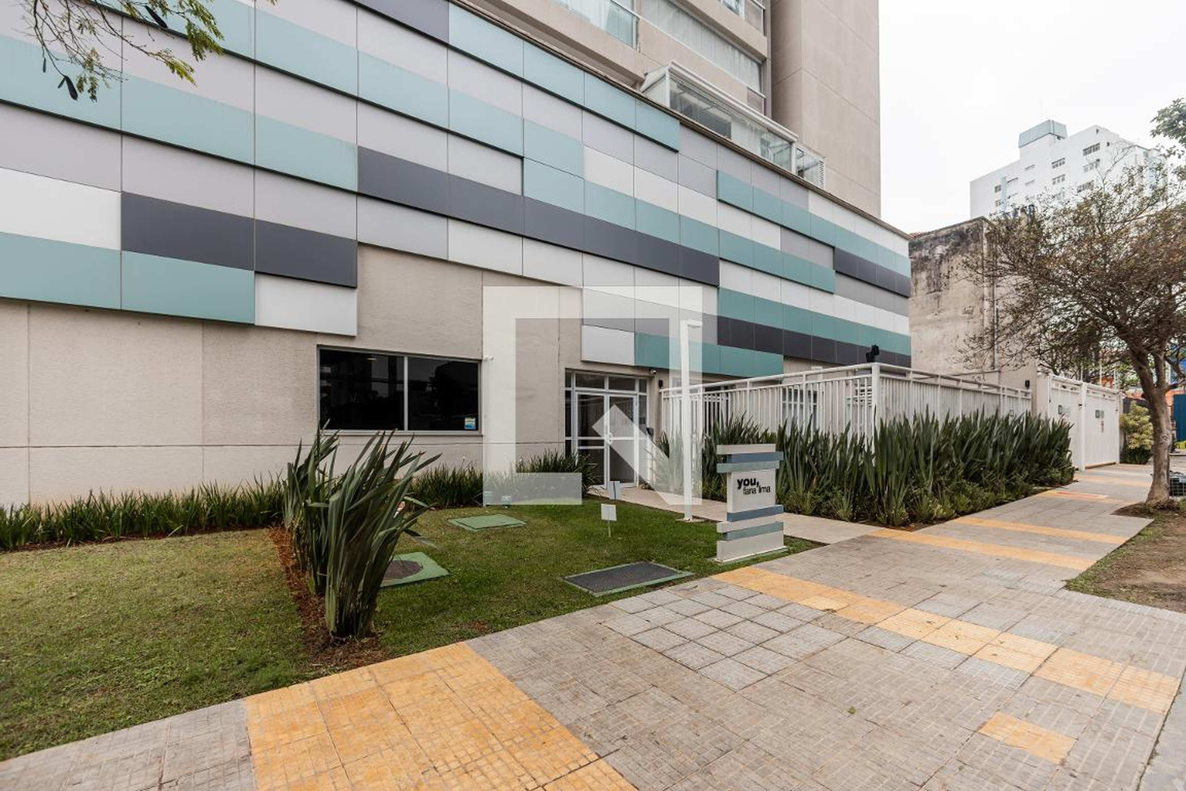 Fachada do Condomínio Condomínio You Faria Lima