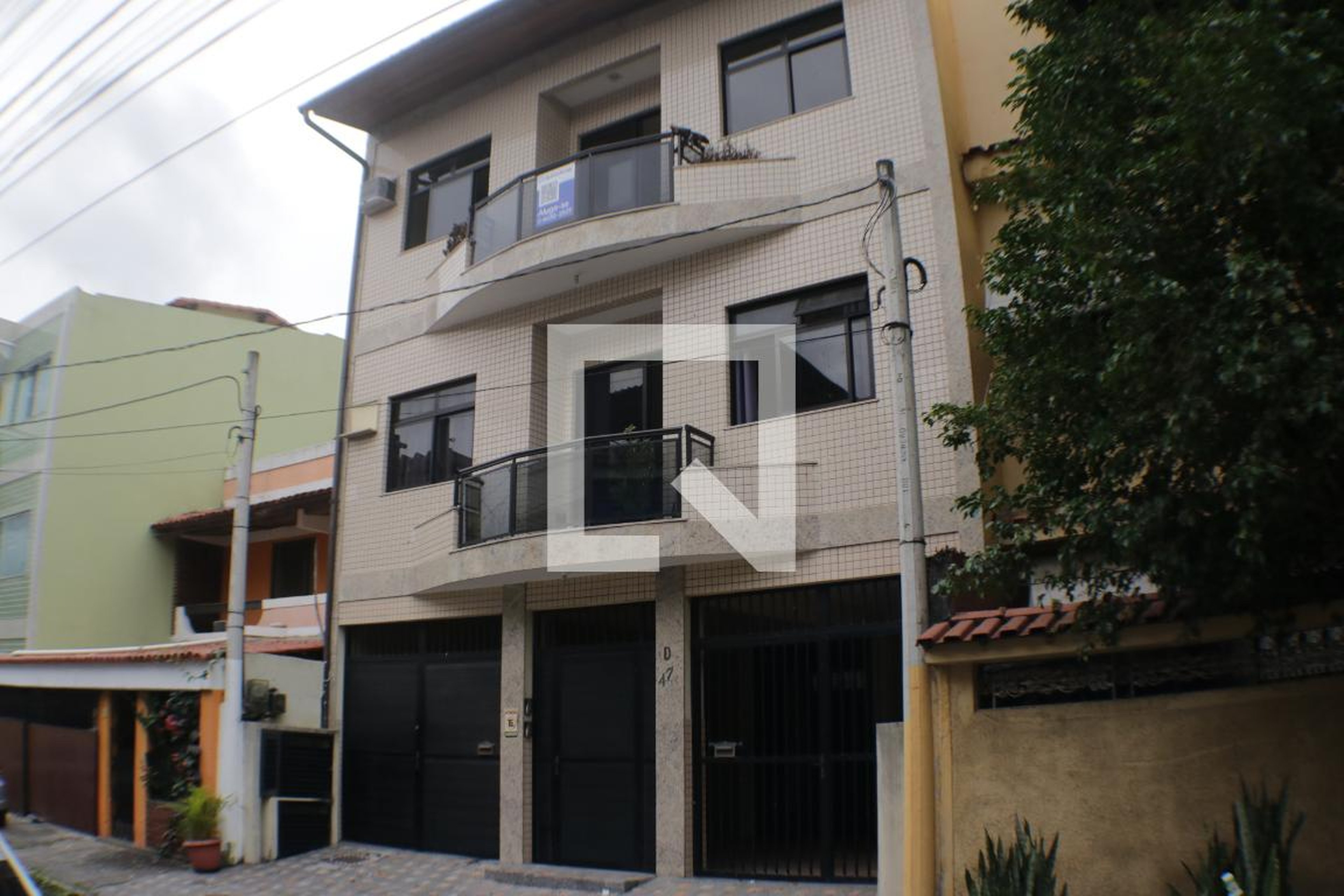 Fachada Condomínio em Rua do Cacau, 47