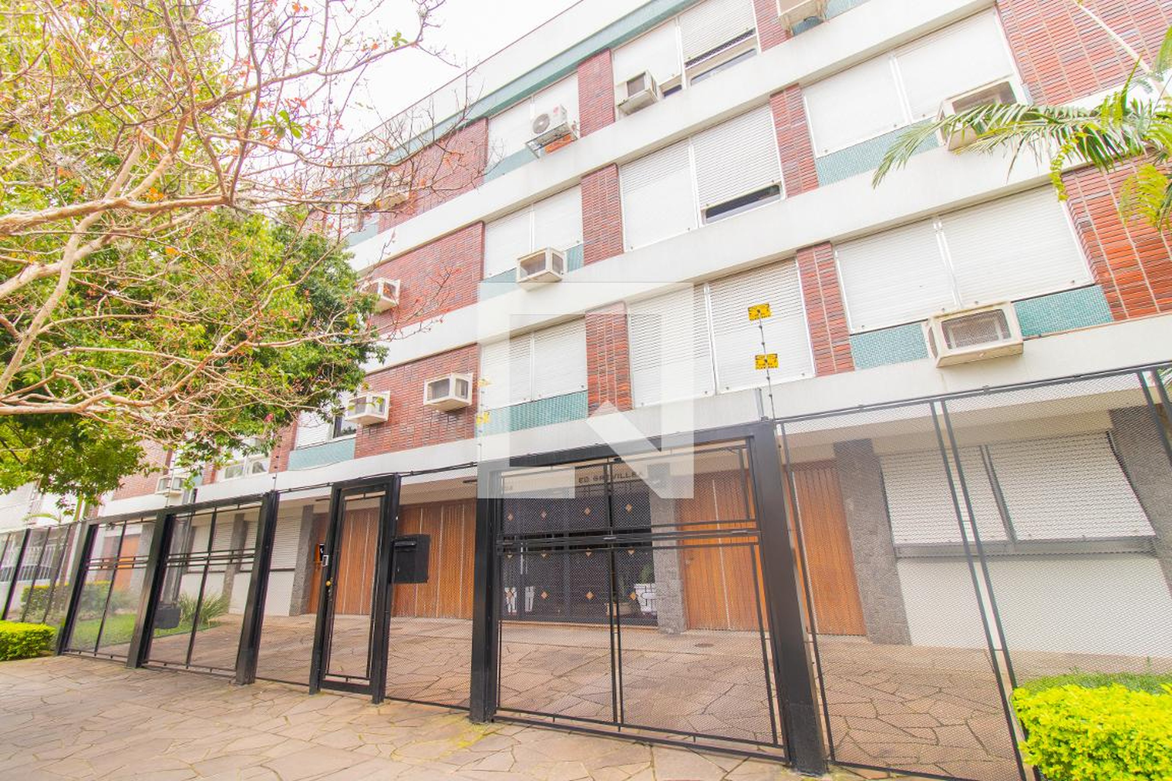 Fachada Condomínio em Rua Comendador Rodolfo Gomes, 504