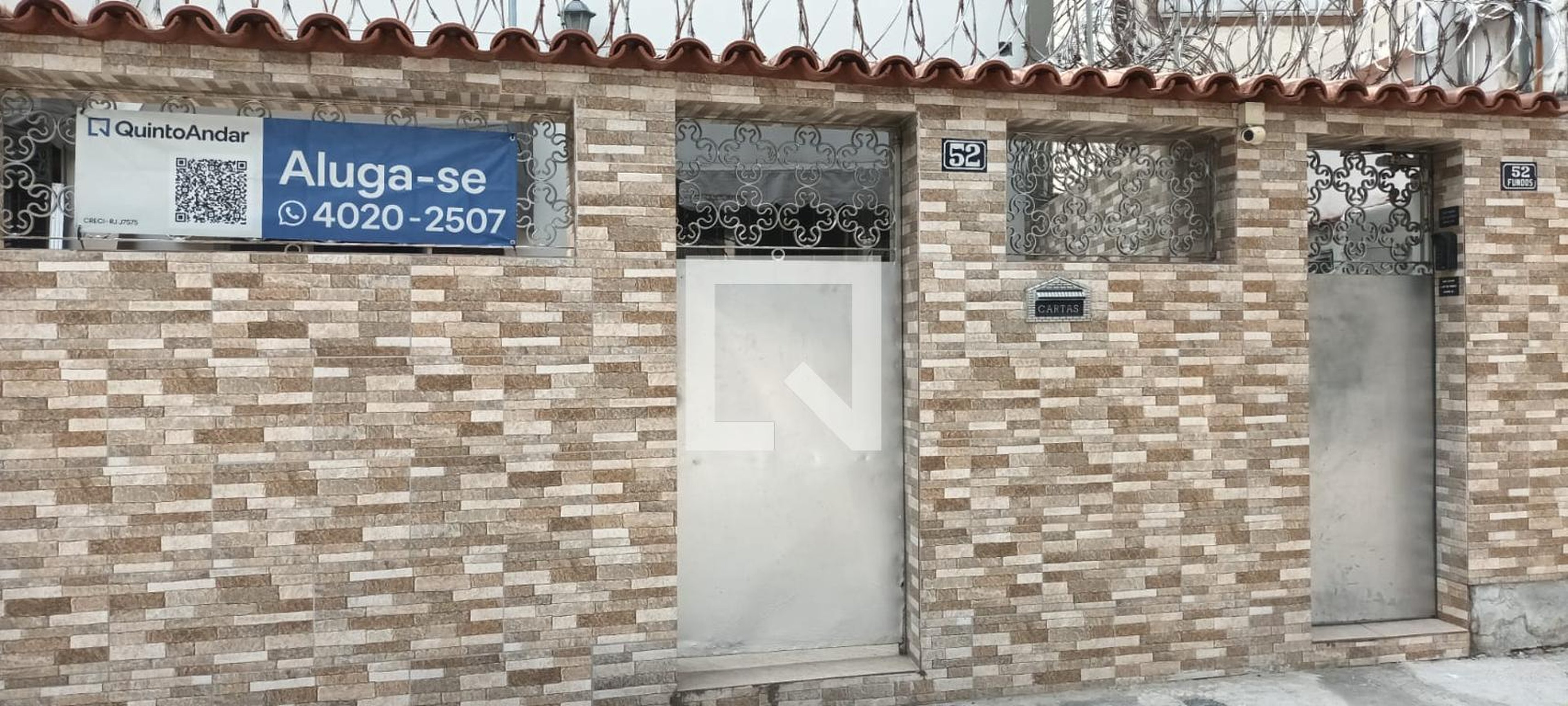 Fachada Condomínio em Rua Doutor Pache de Faria, 52