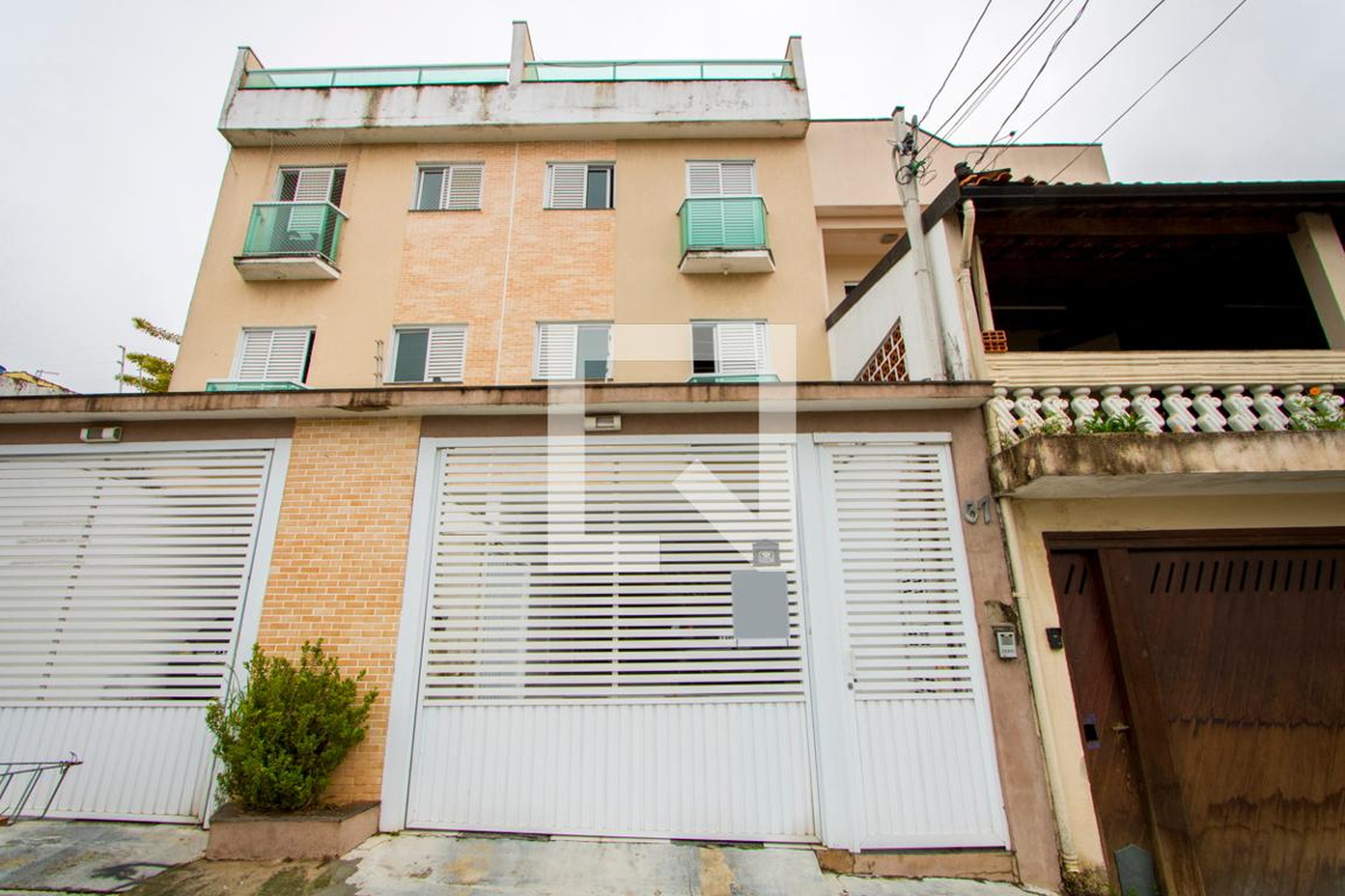 Fachada Condomínio em Rua Marcondes Machado, 67