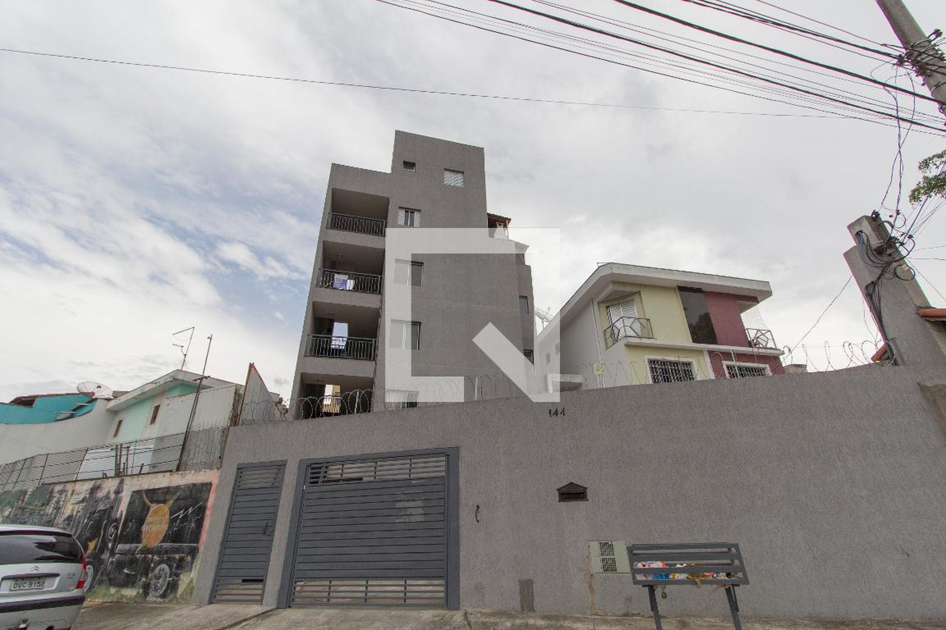 Fachada Condomínio em Rua Sampei Sato, 124