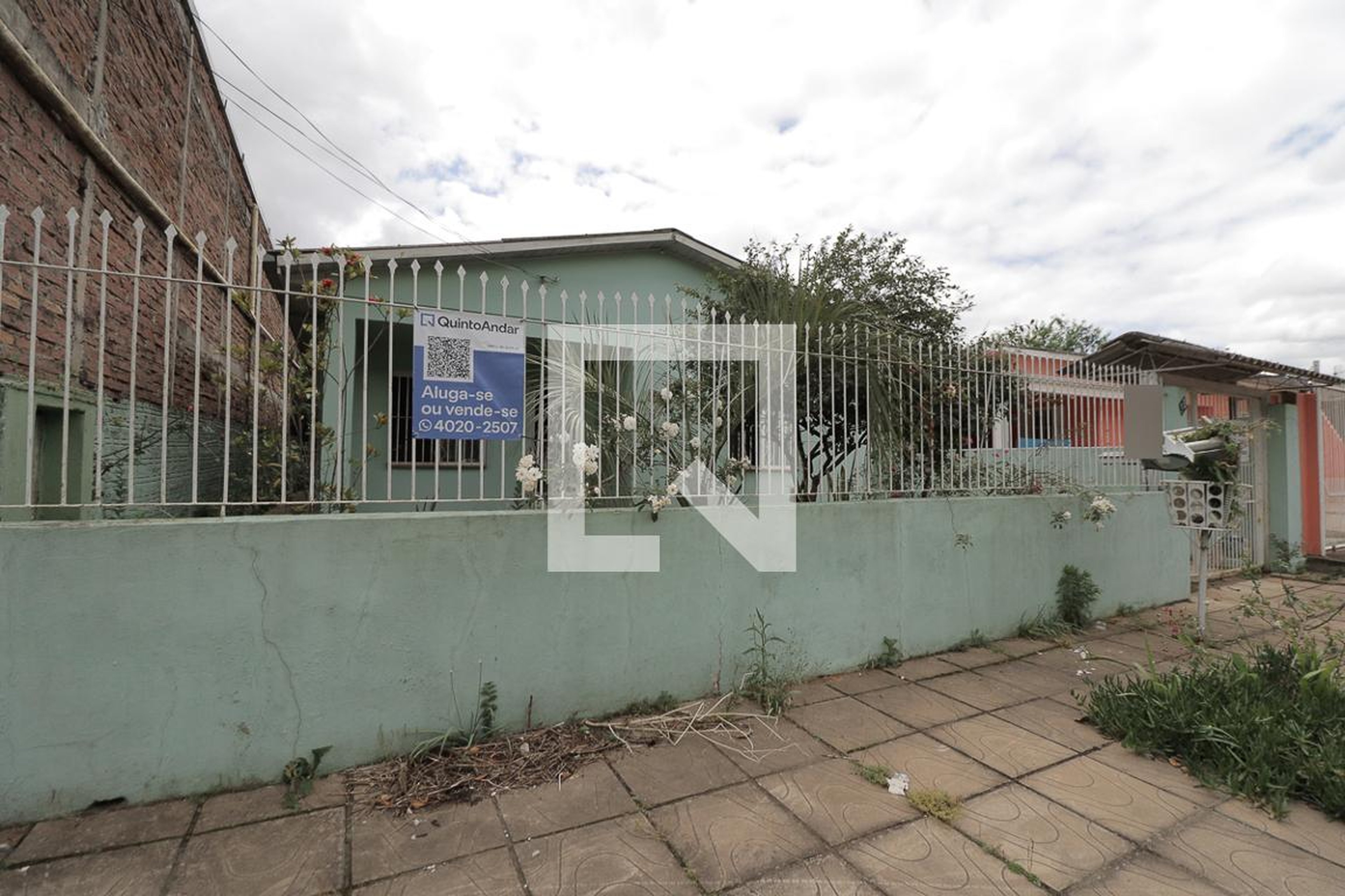 Fachada Condomínio em Rua Claris Amadéo Rossi, 30