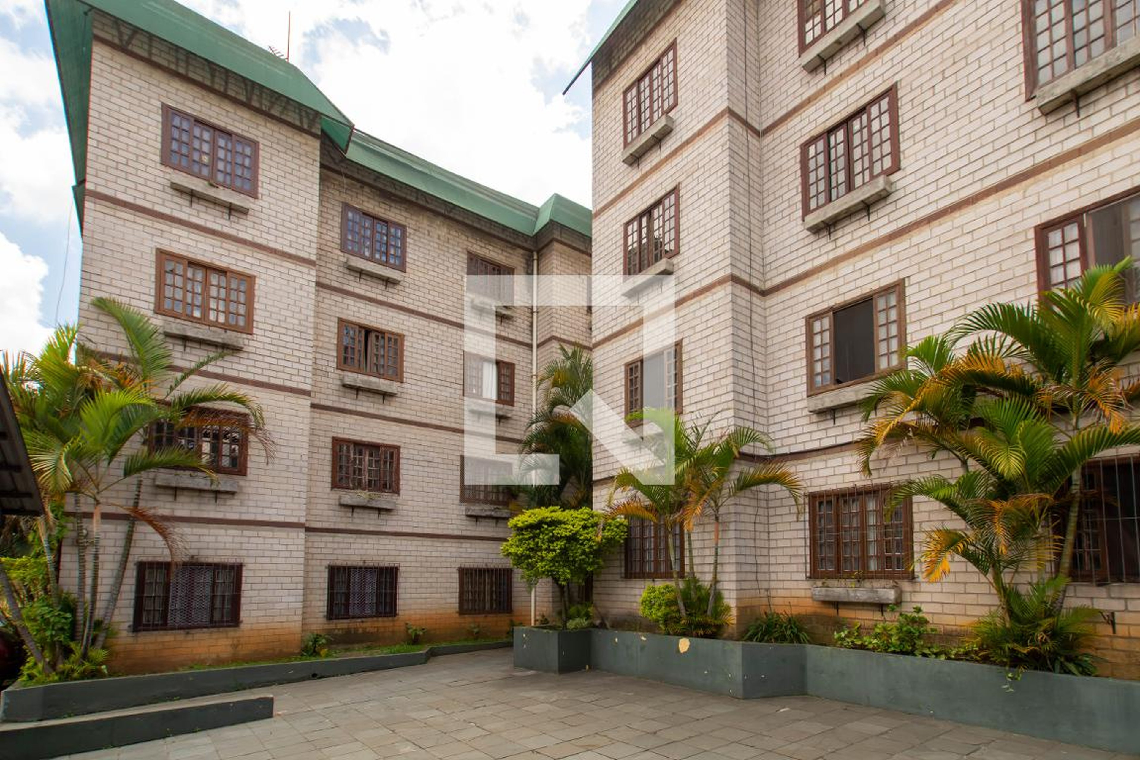 Fachada do condomínio Condomínio Sandra Regina