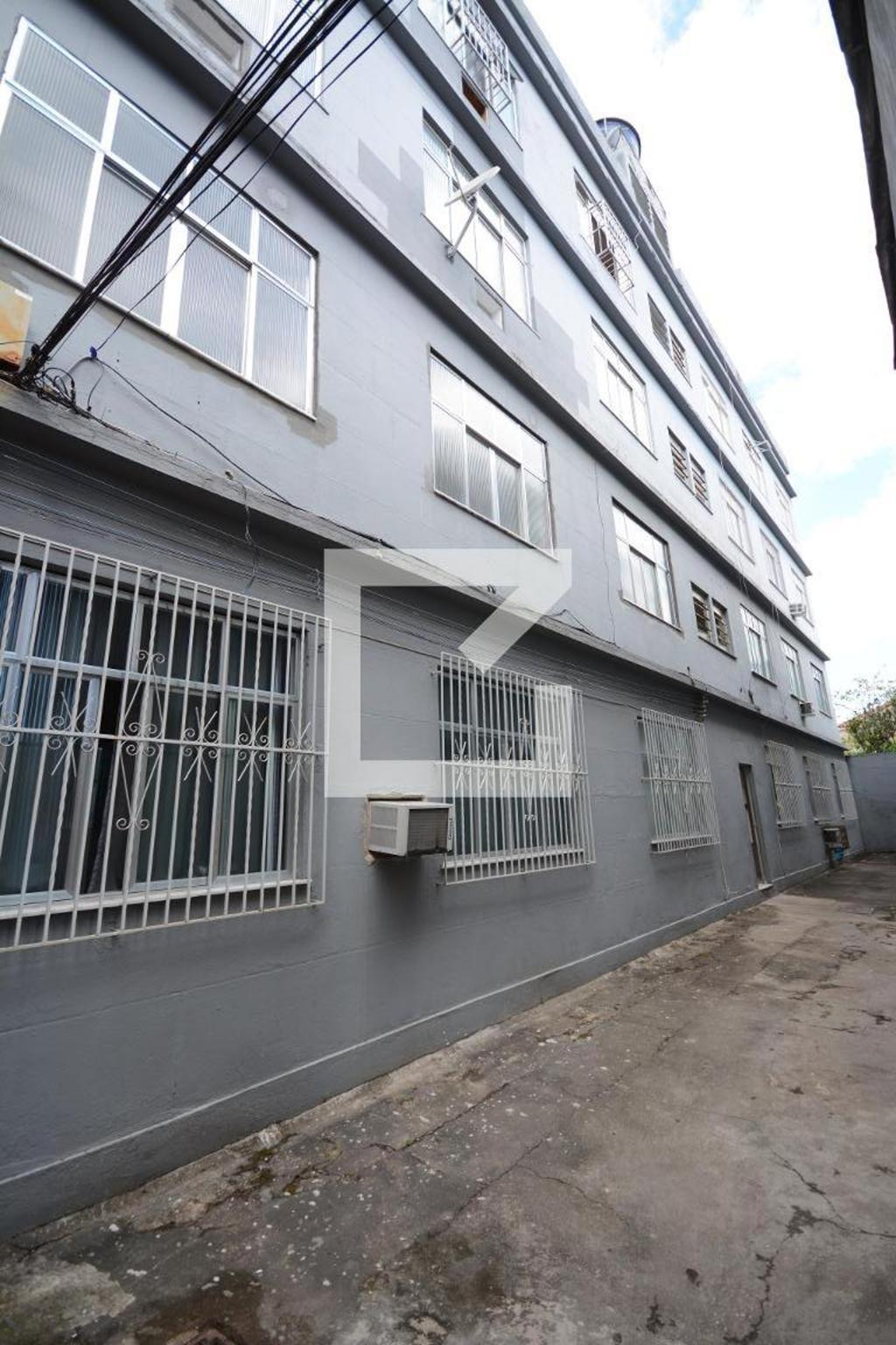 Fachada Condomínio em Rua Grão Magrico, 125