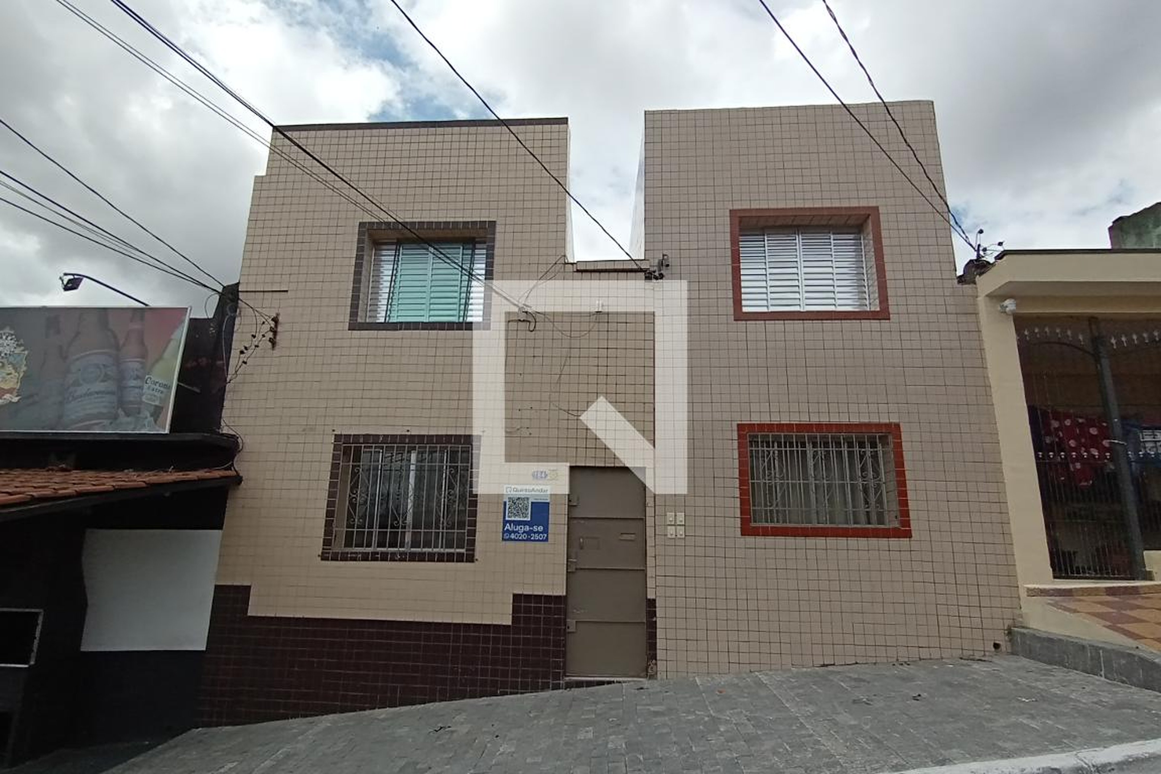 Fachada Condomínio em Rua Lélio Mendes, 184