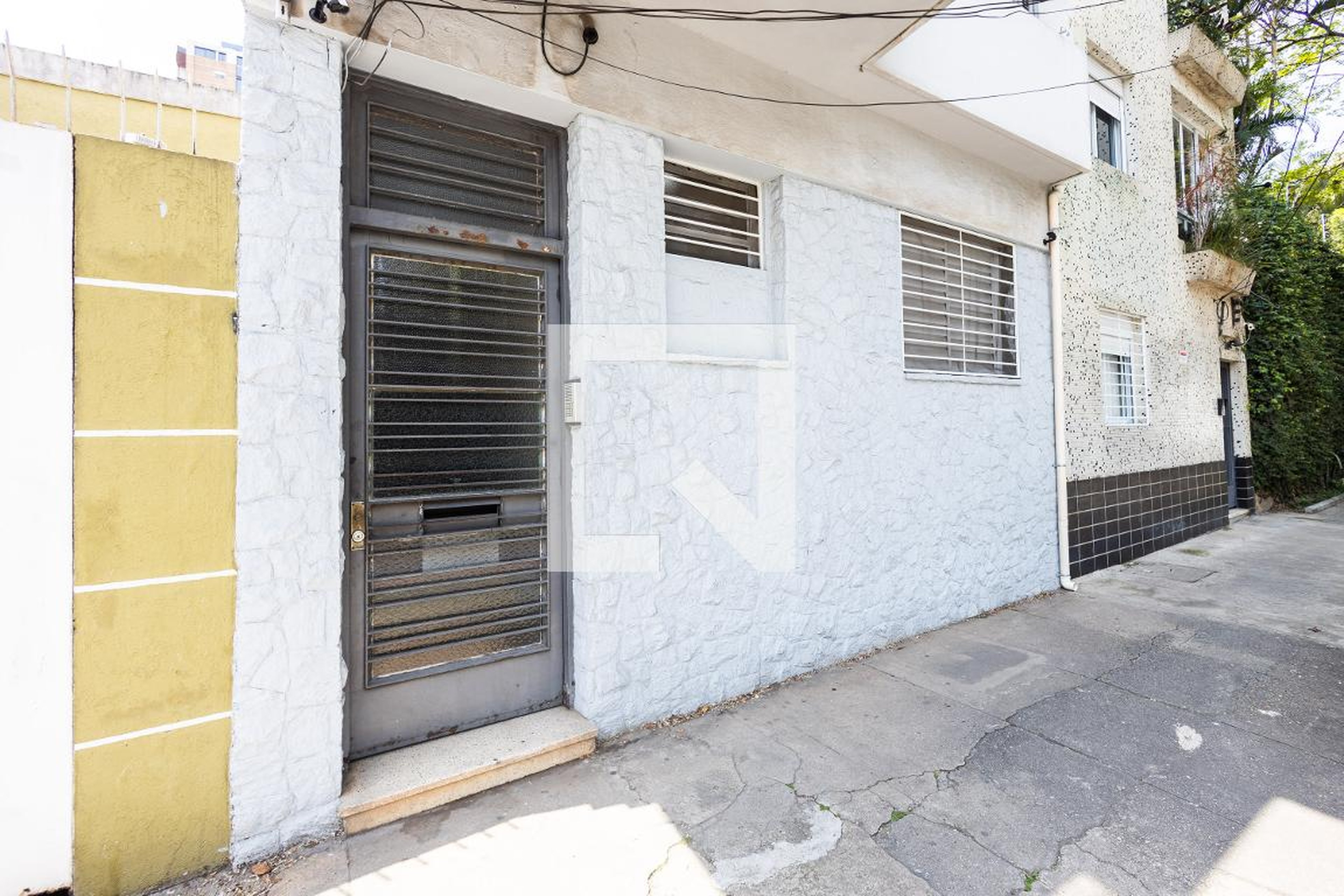 Fachada Condomínio em Rua Tucambira, 54