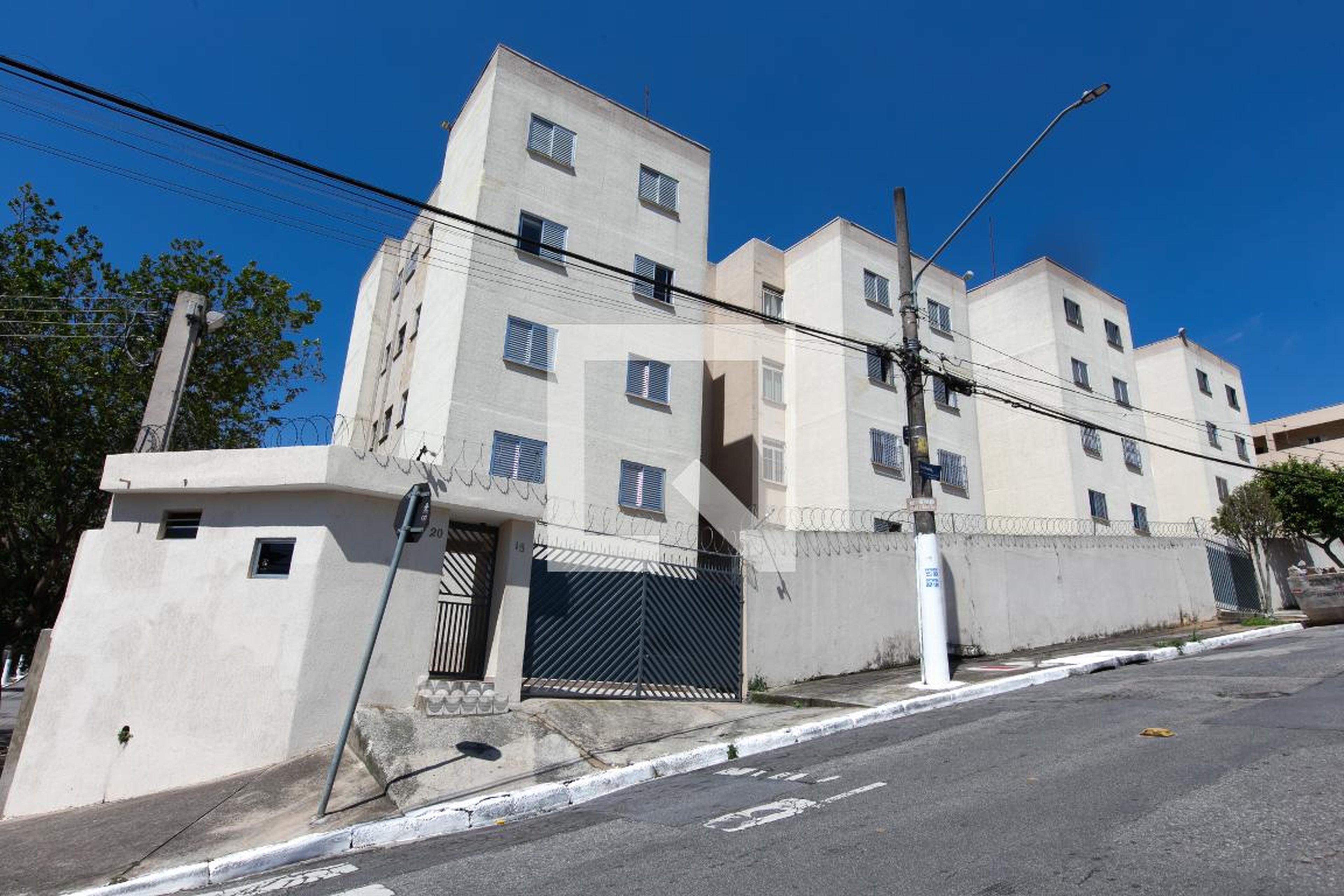 Fachada do Condomínio Condomínio Topazio