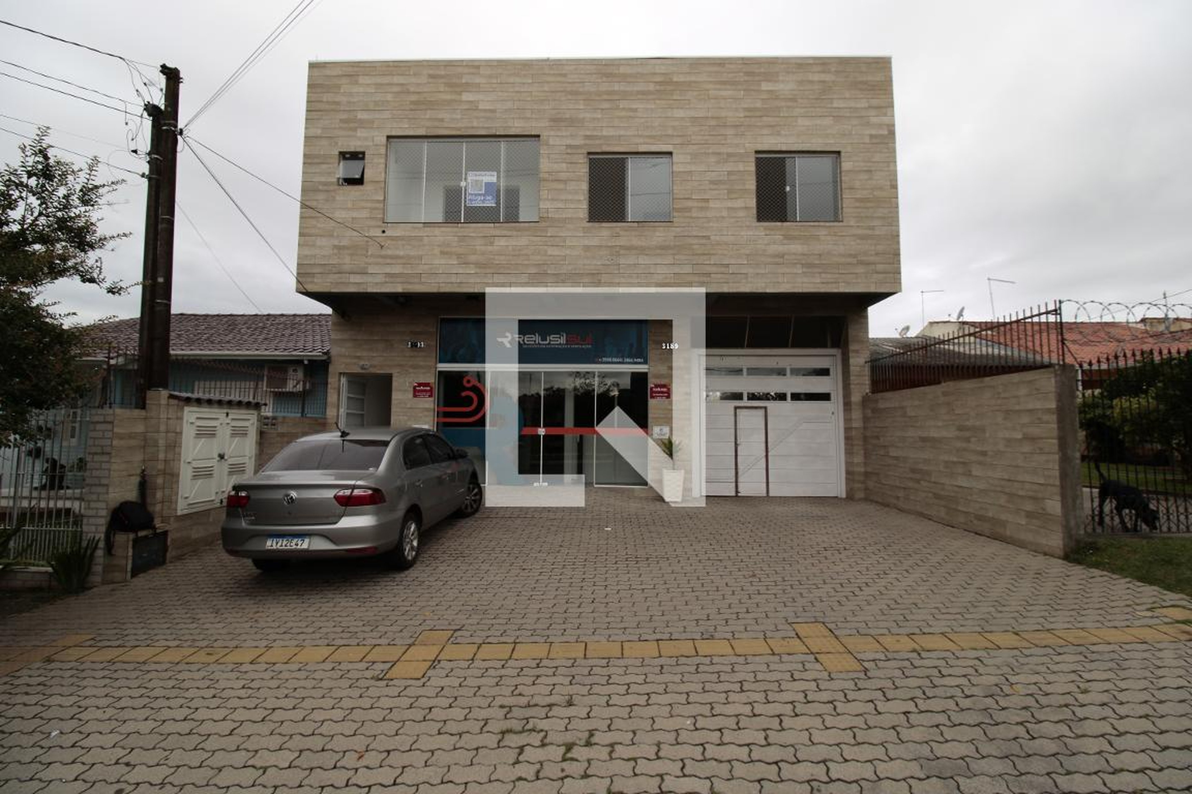 Fachada Condomínio em Rua Açucena, 3189