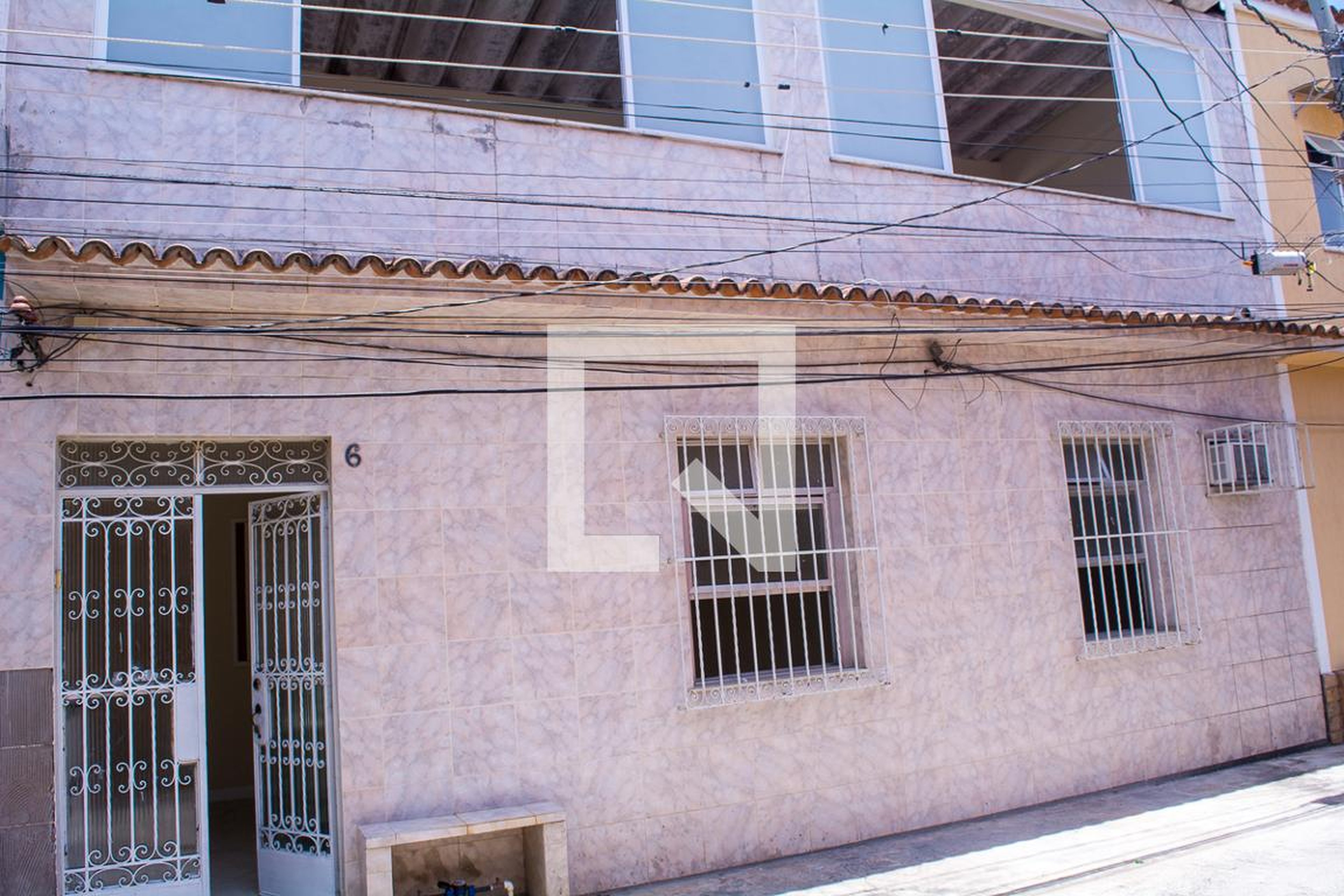 Fachada Condomínio em Rua Barbosa da Silva, 77