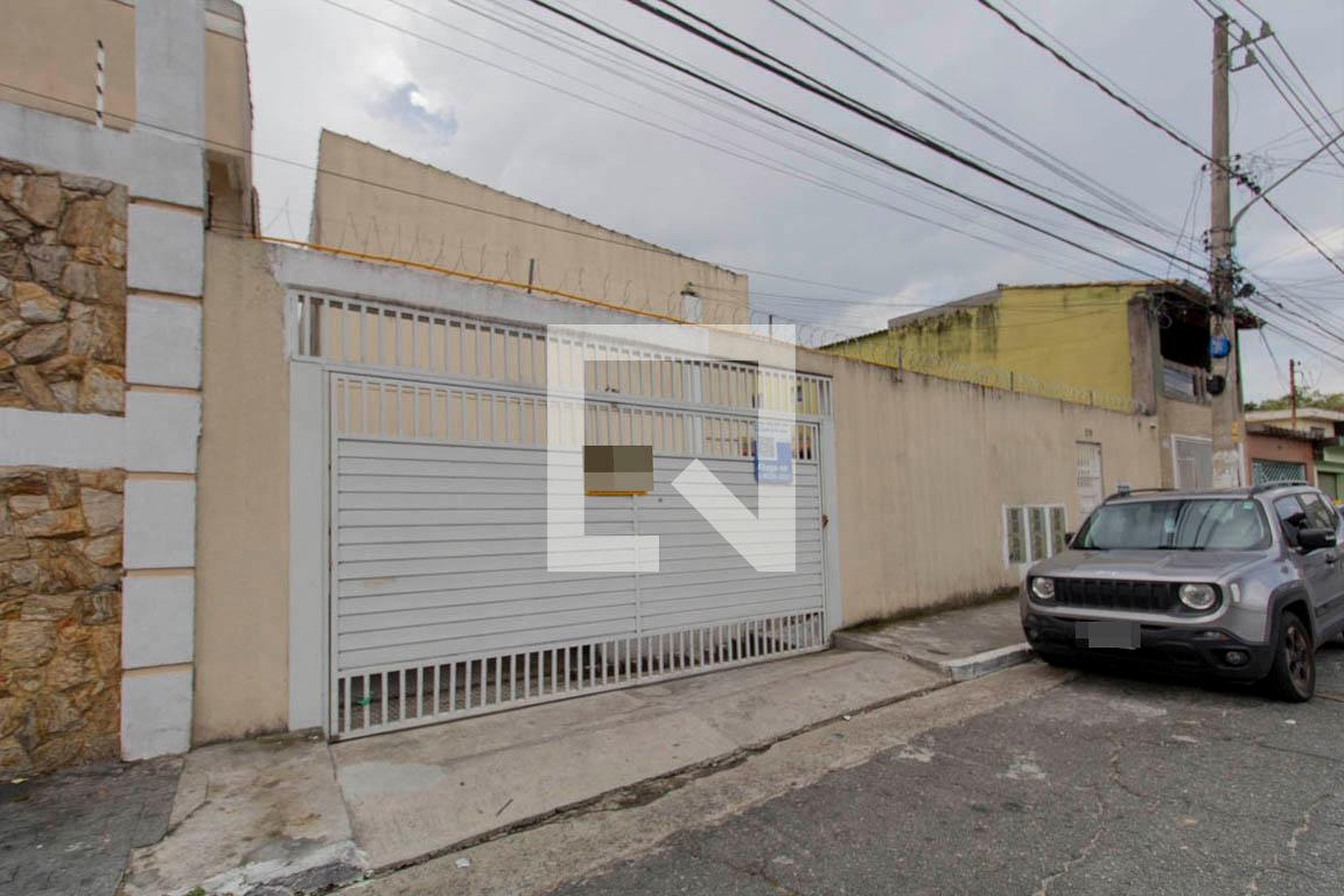 Fachada Condomínio em Rua Antônio de Freitas Toledo, 219