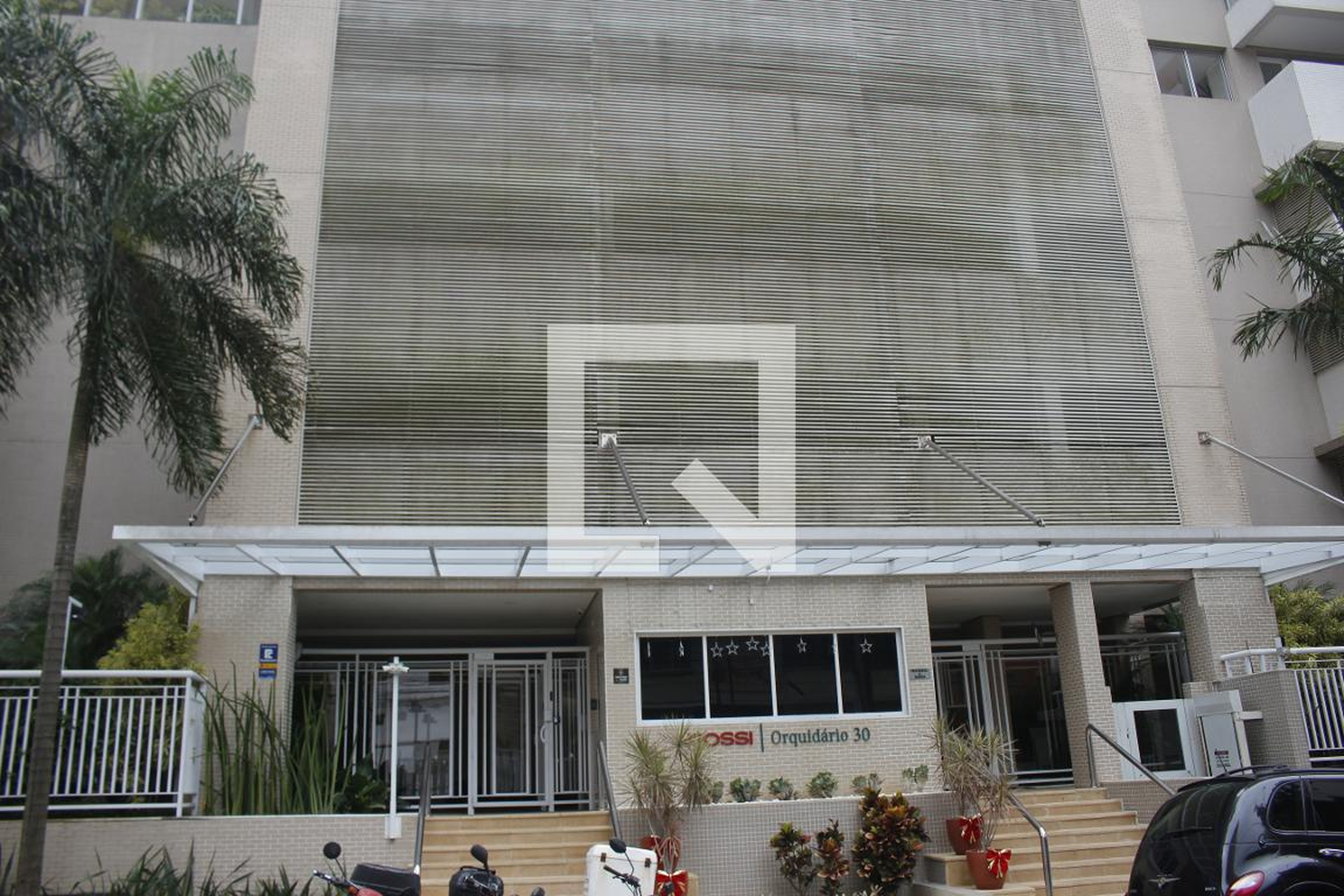 Fachada do condomínio Condomínio Rossi Orquidário