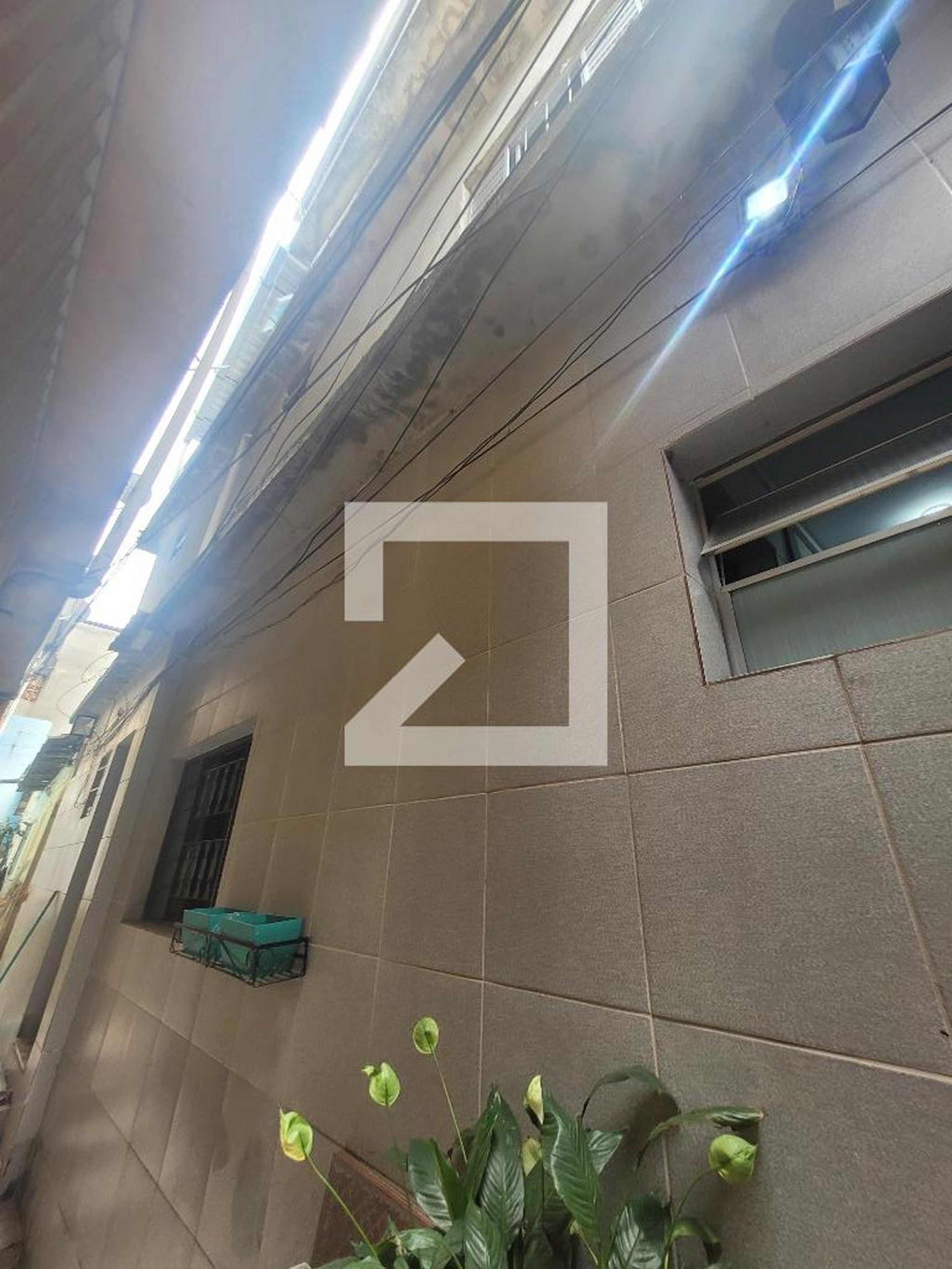 Fachada Condomínio em Rua Craveiro de Sá, 102