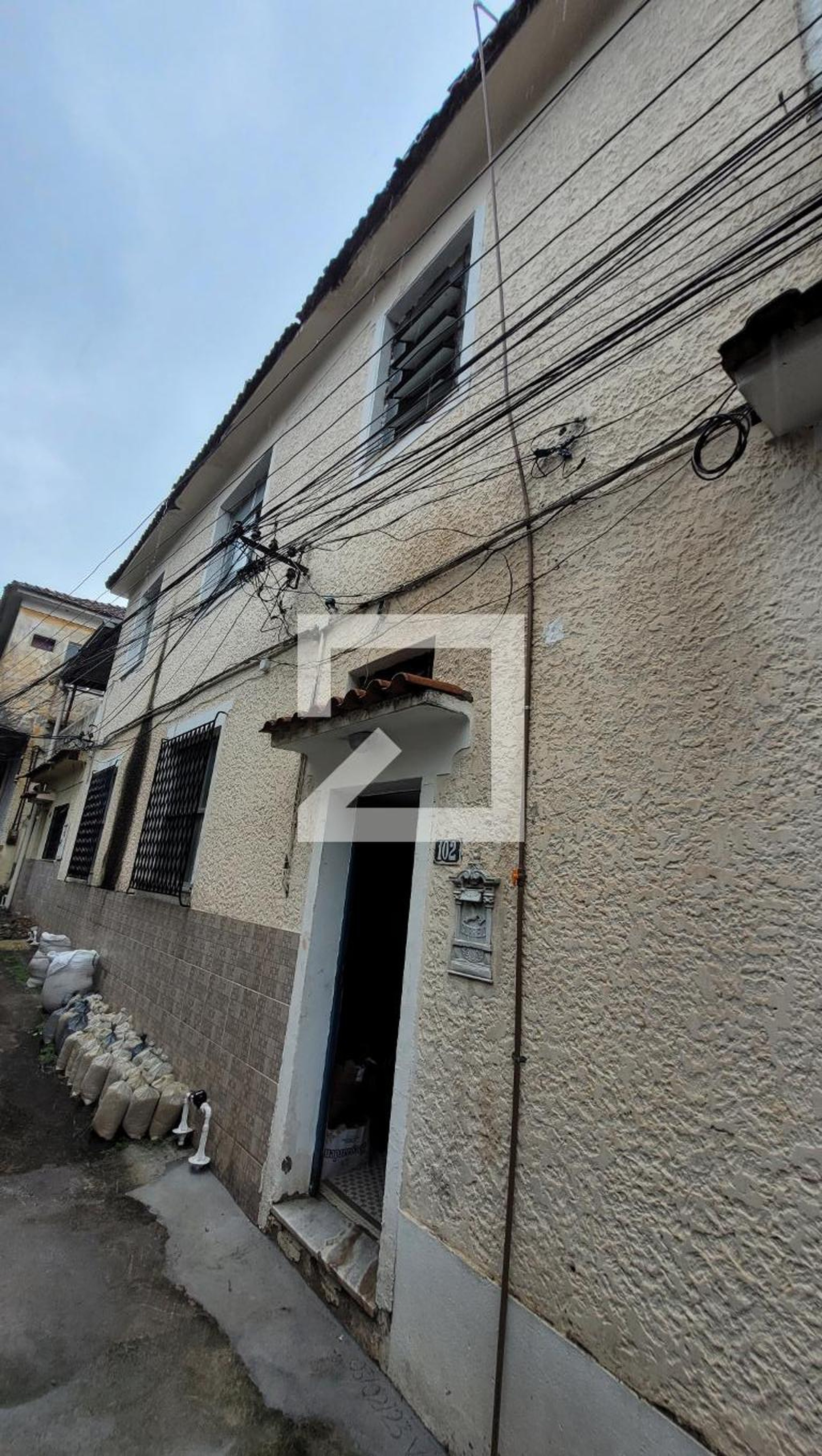 Fachada Condomínio em Rua Andrade Figueira, 525