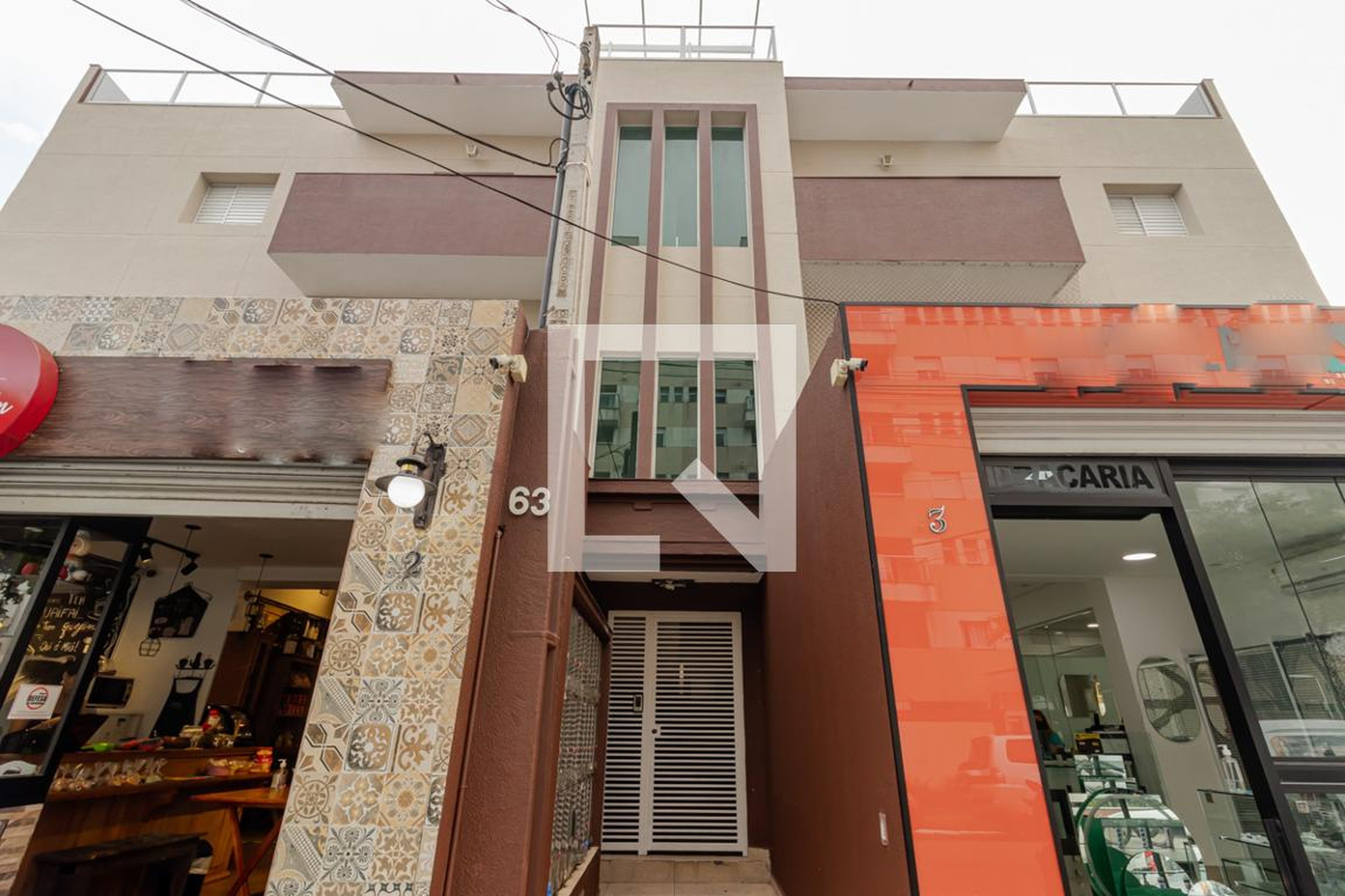 Fachada Condomínio em Avenida Armando Ferrentini, 63