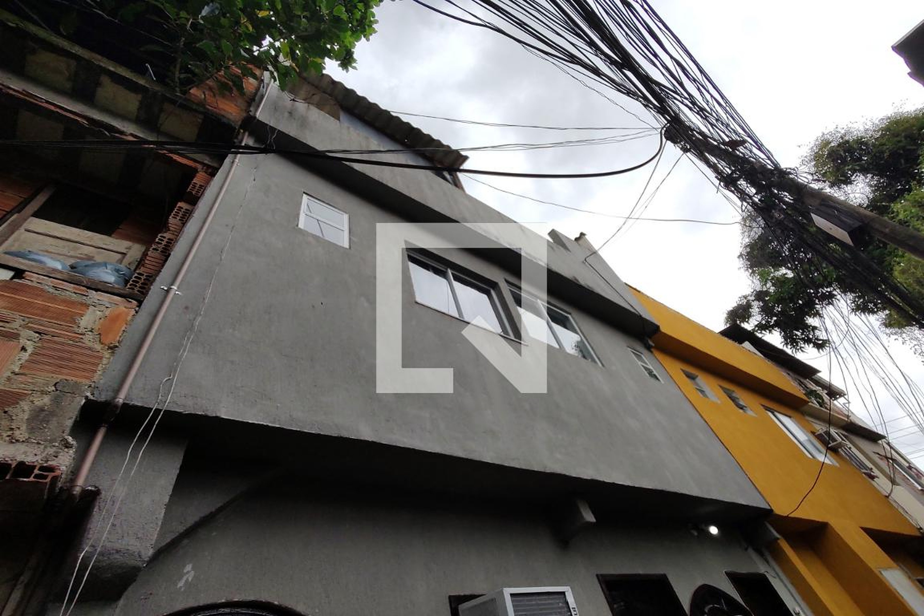 Fachada Condomínio em Rua Quintanilha, 476