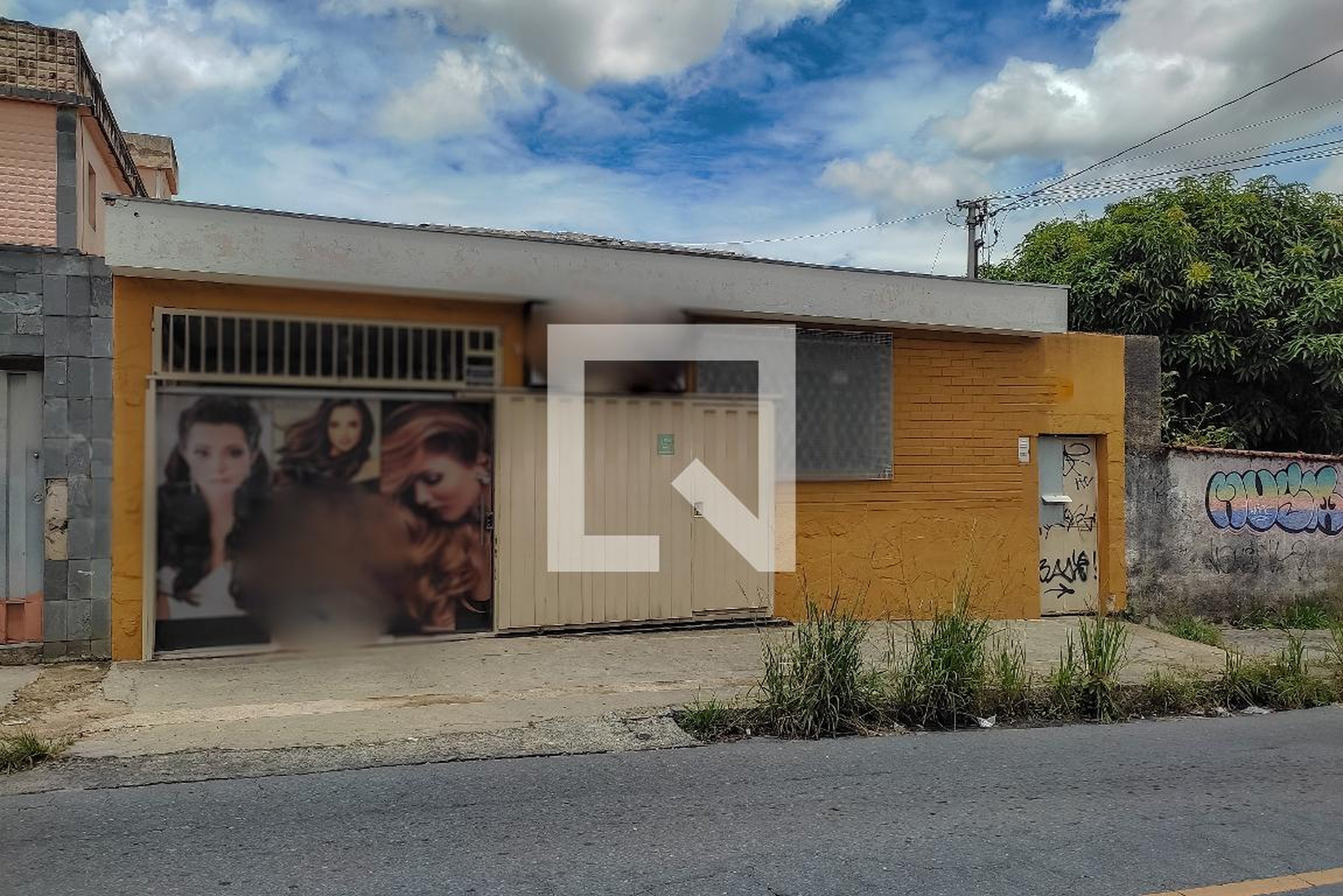 Fachada Condomínio em Rua Pitangui, 213