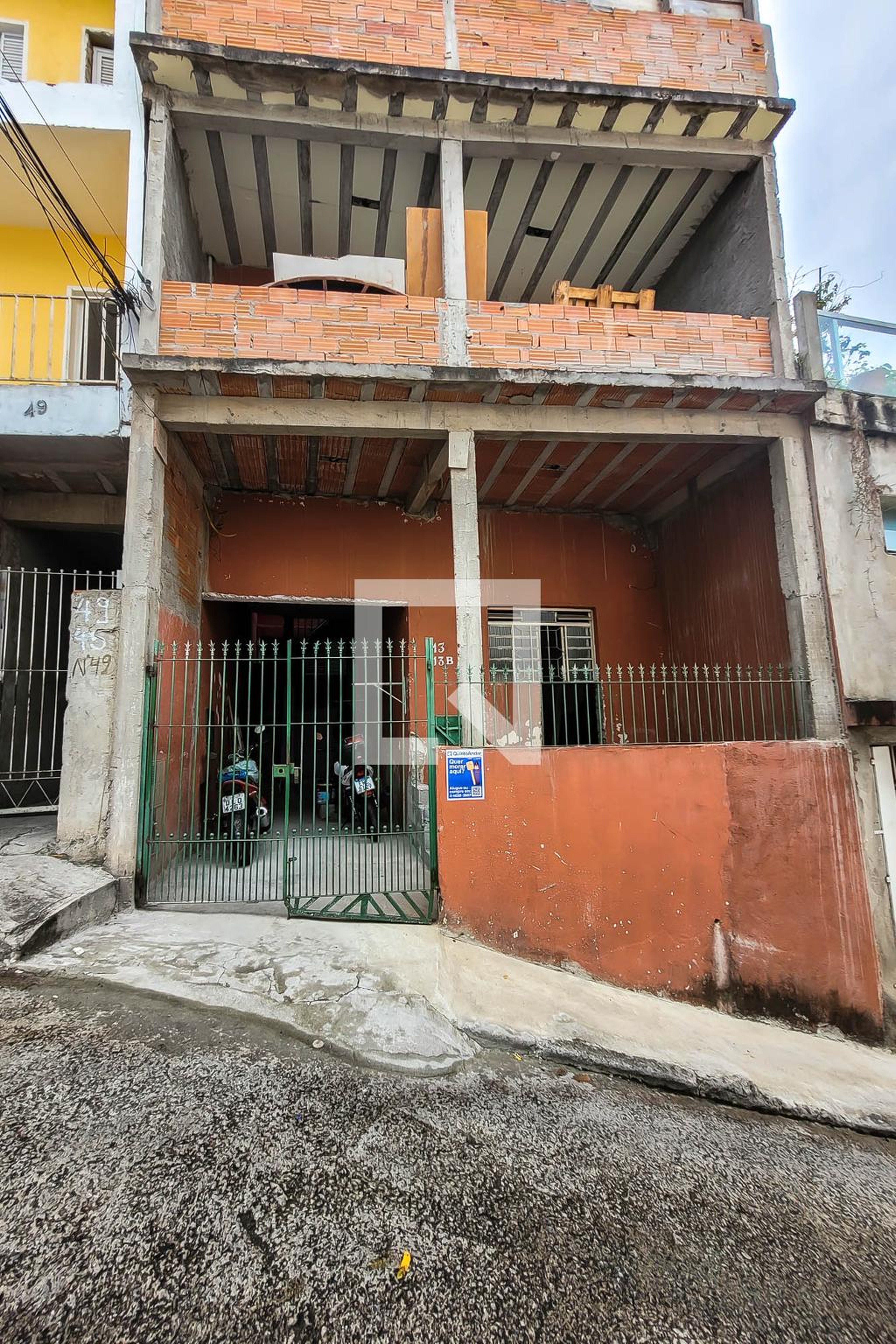 Fachada Condomínio em Rua Buturuna, 13