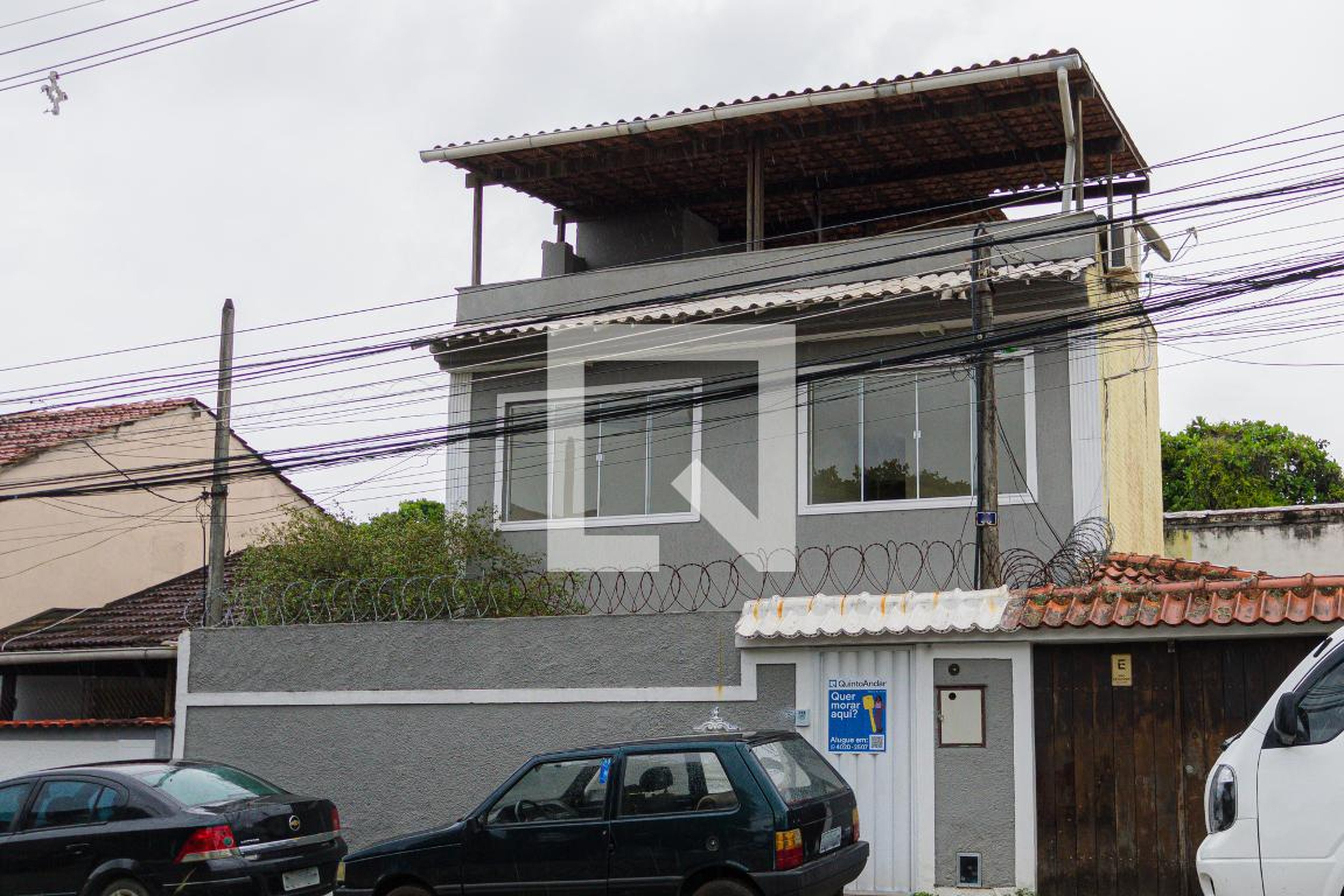 Fachada Condomínio em Rua Acúrcio Tôrres, 48