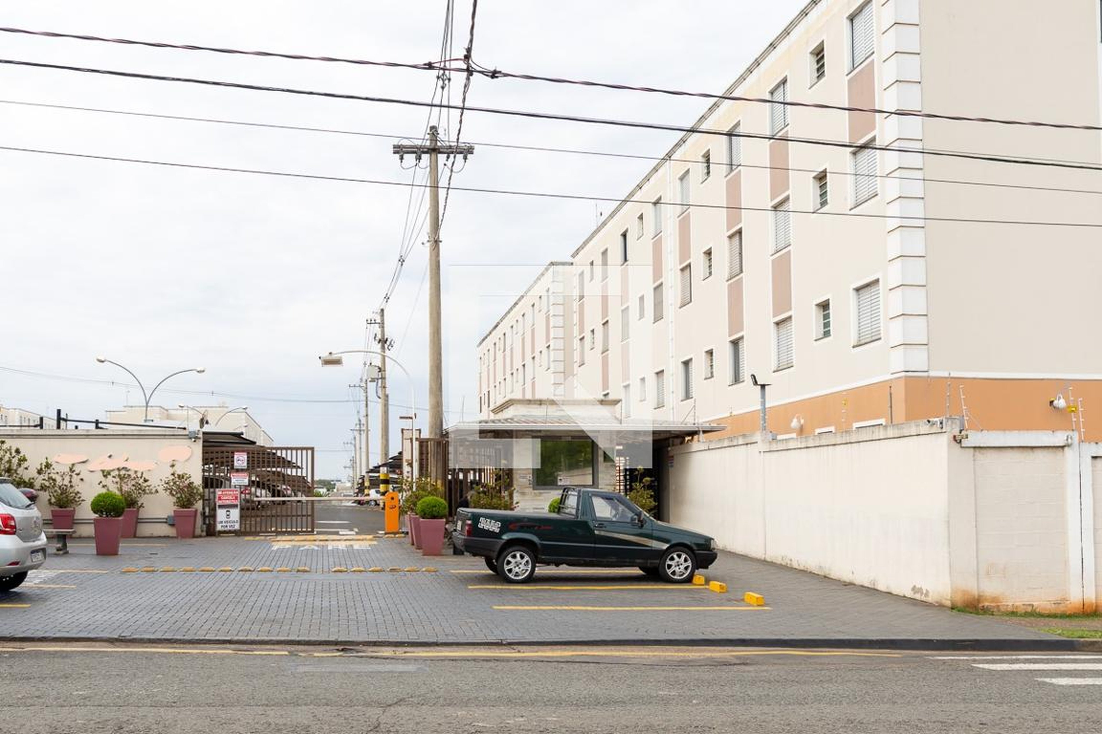 Fachada do Condomínio Condomínio Asteca