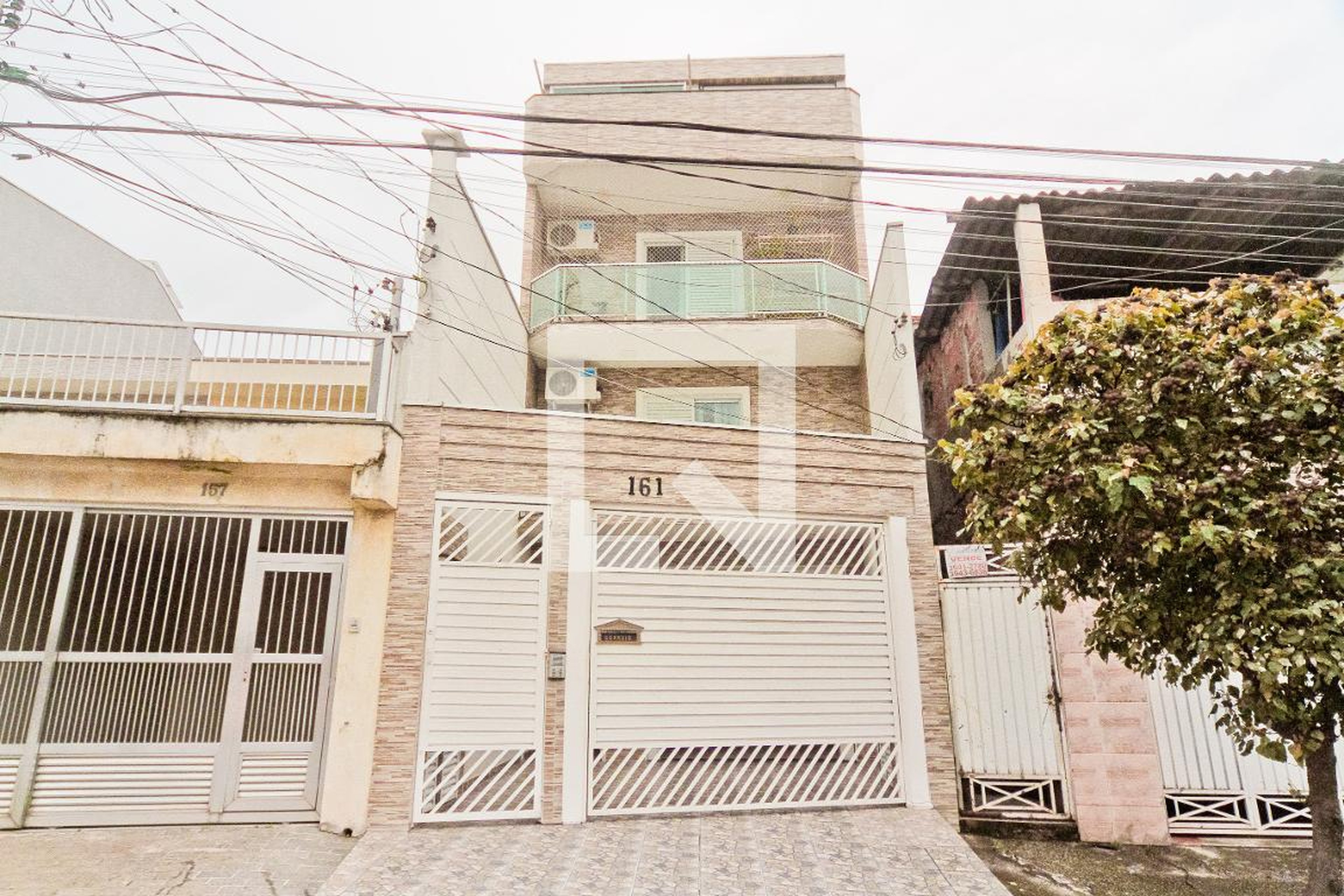 Fachada Condomínio em Rua Eusébio da Silva, 161