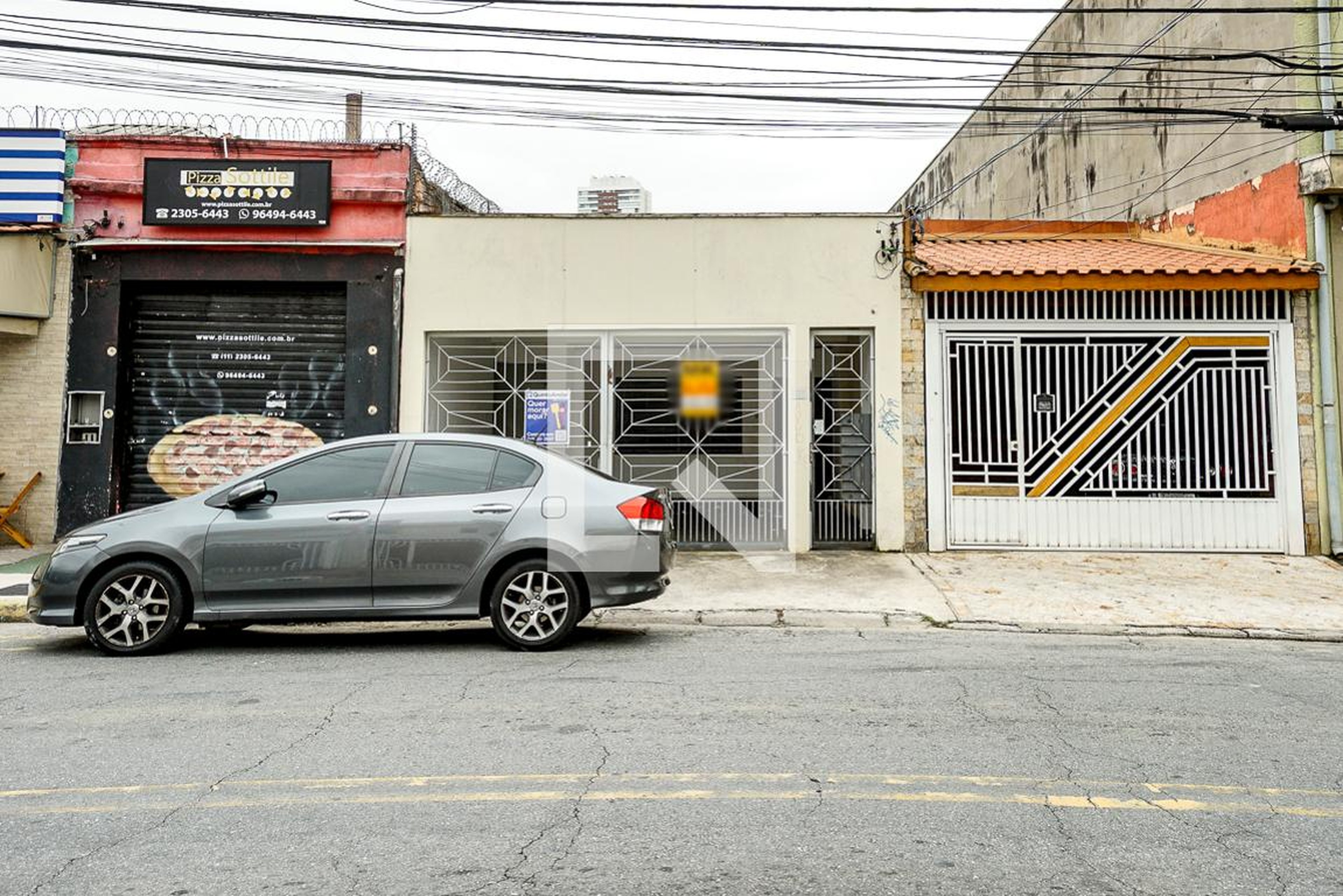 Fachada Condomínio em Rua Arnaldo Cintra, 143