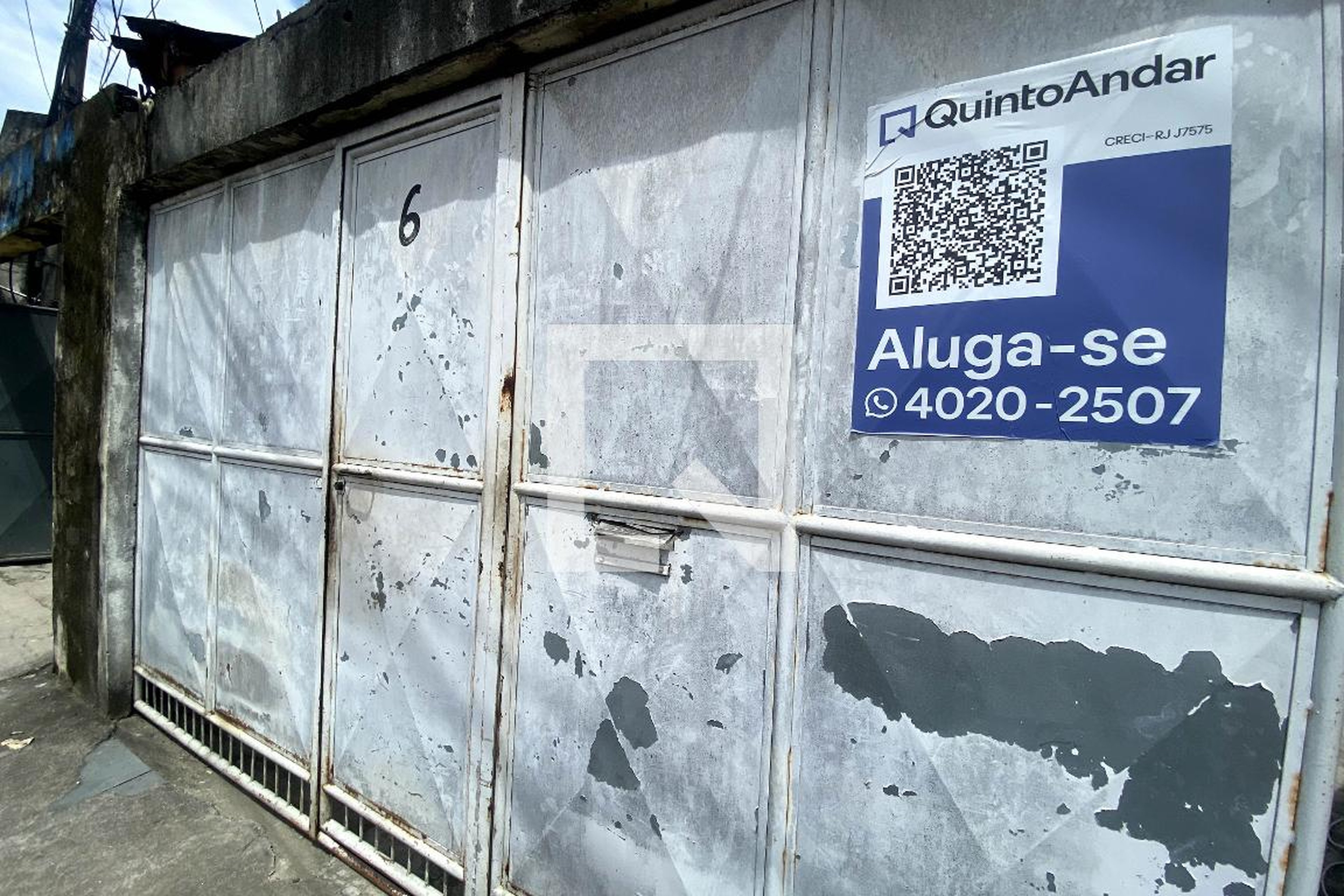 Fachada Condomínio em Rua Almirante Protógenes Guimarães, 6