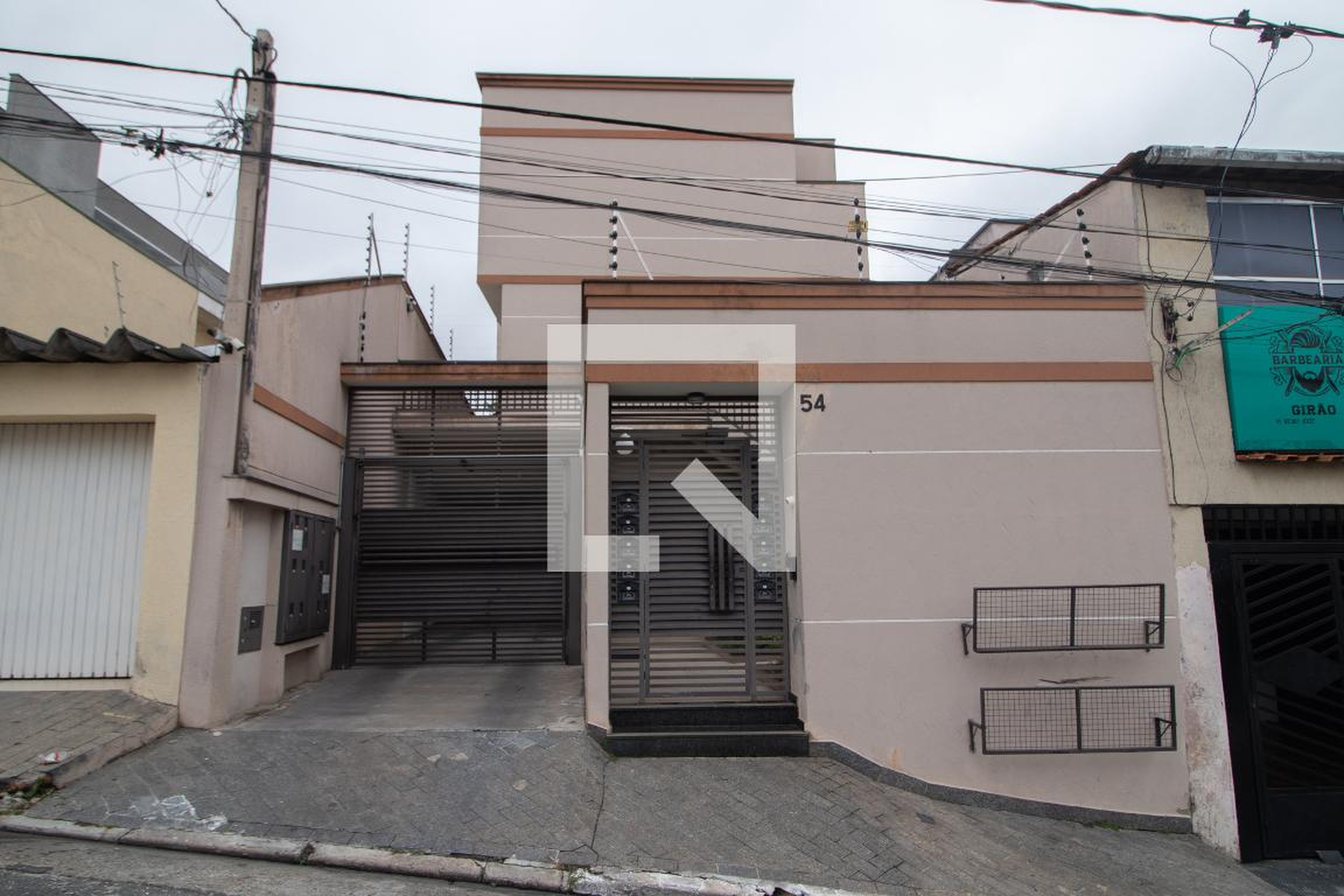 Fachada Condomínio em Rua Tolêdo Malta, 54