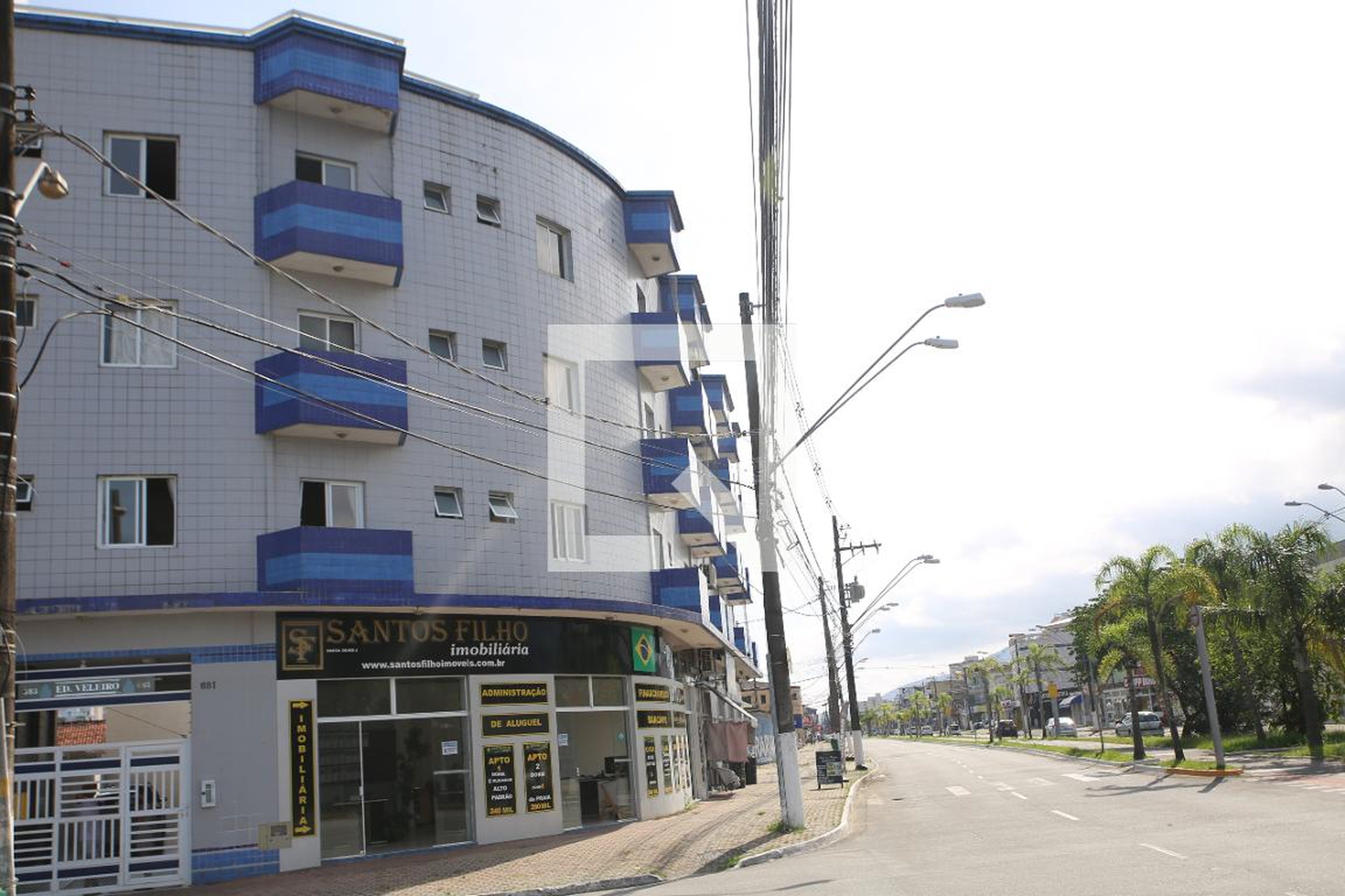 Fachada Condomínio Comercial e Residencial Veleiro
