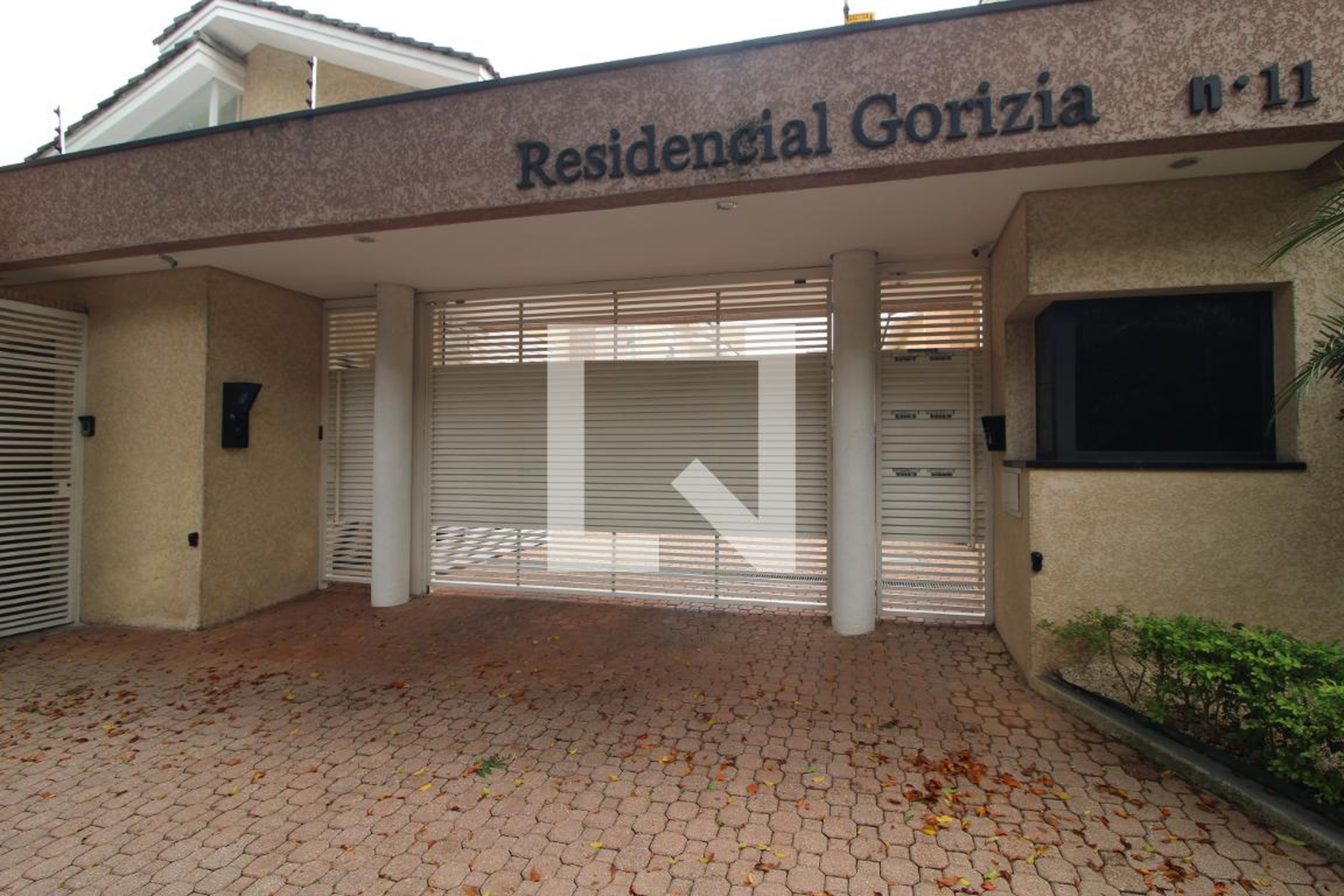 Fachada Condomínio em Rua Carlos Baptista de Magalhães, 11