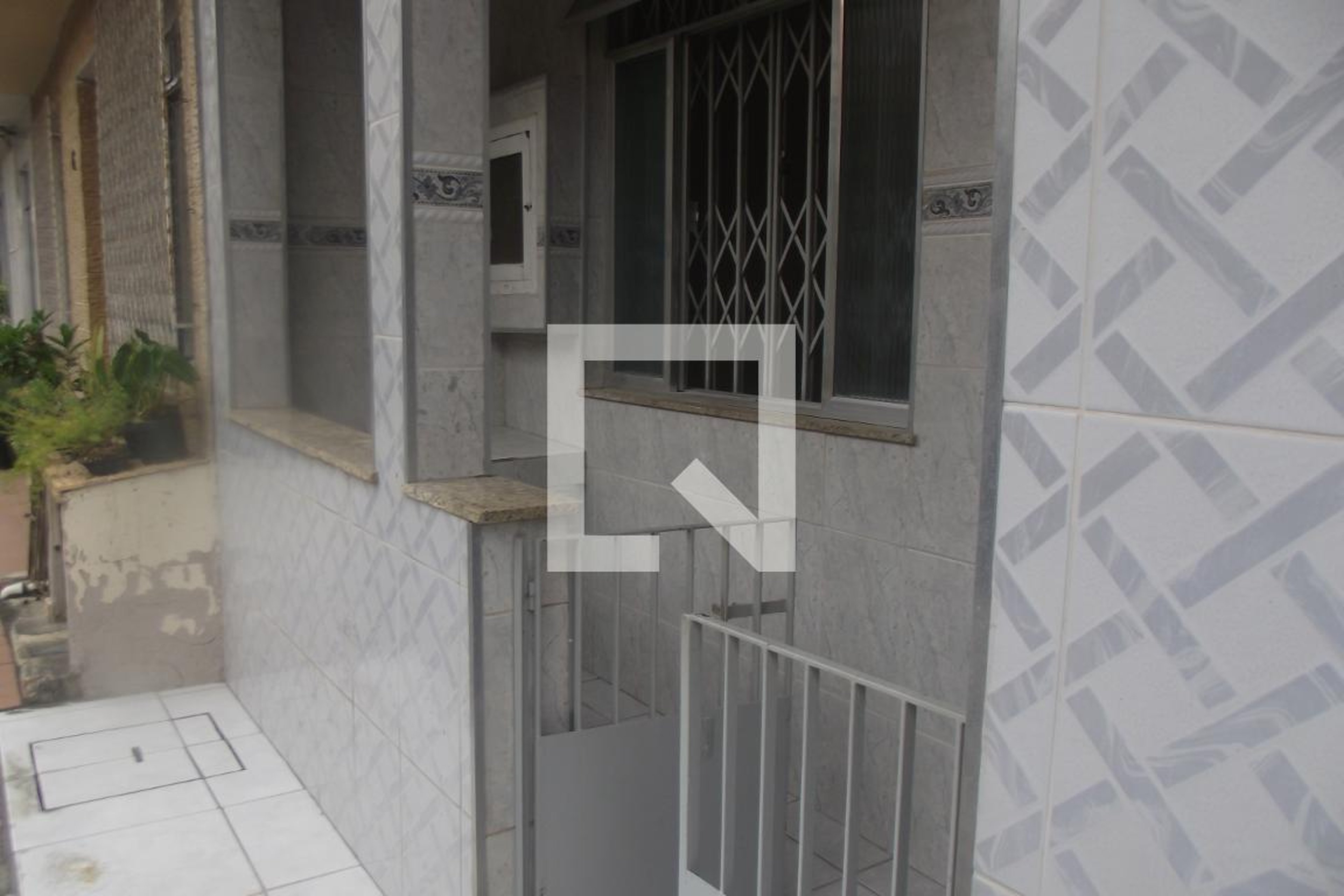 Fachada Condomínio em Rua Honório, 1441