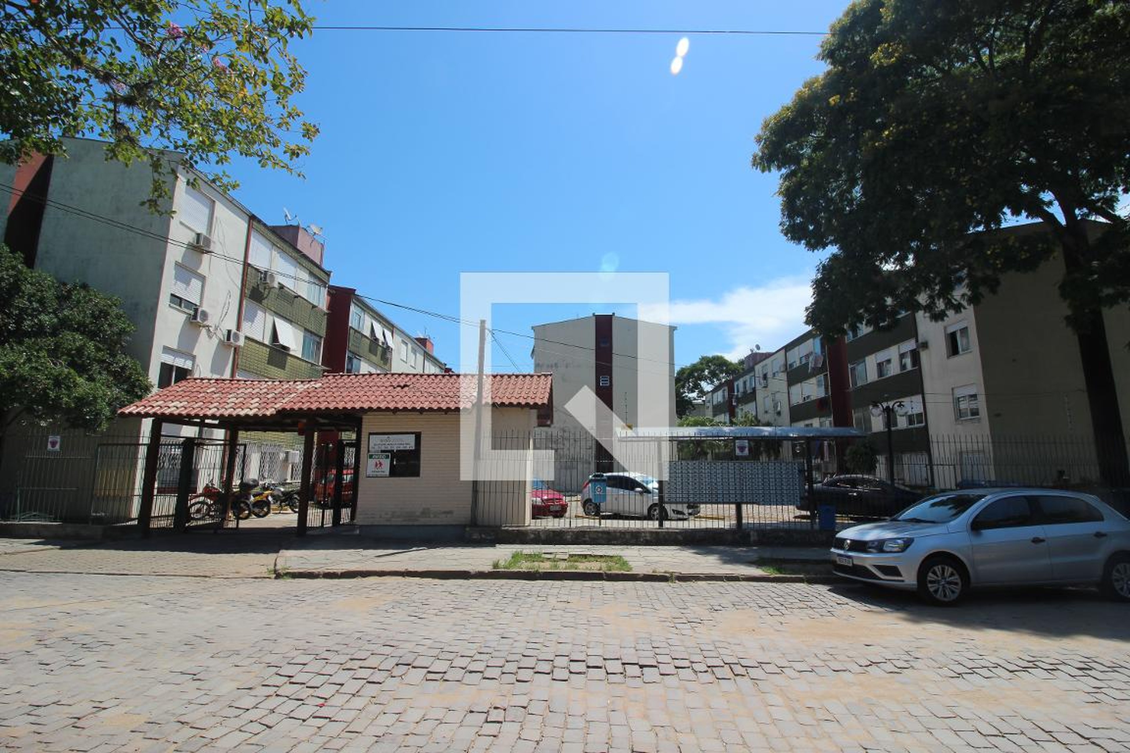 Fachada do Condomínio Condomínio Oásis