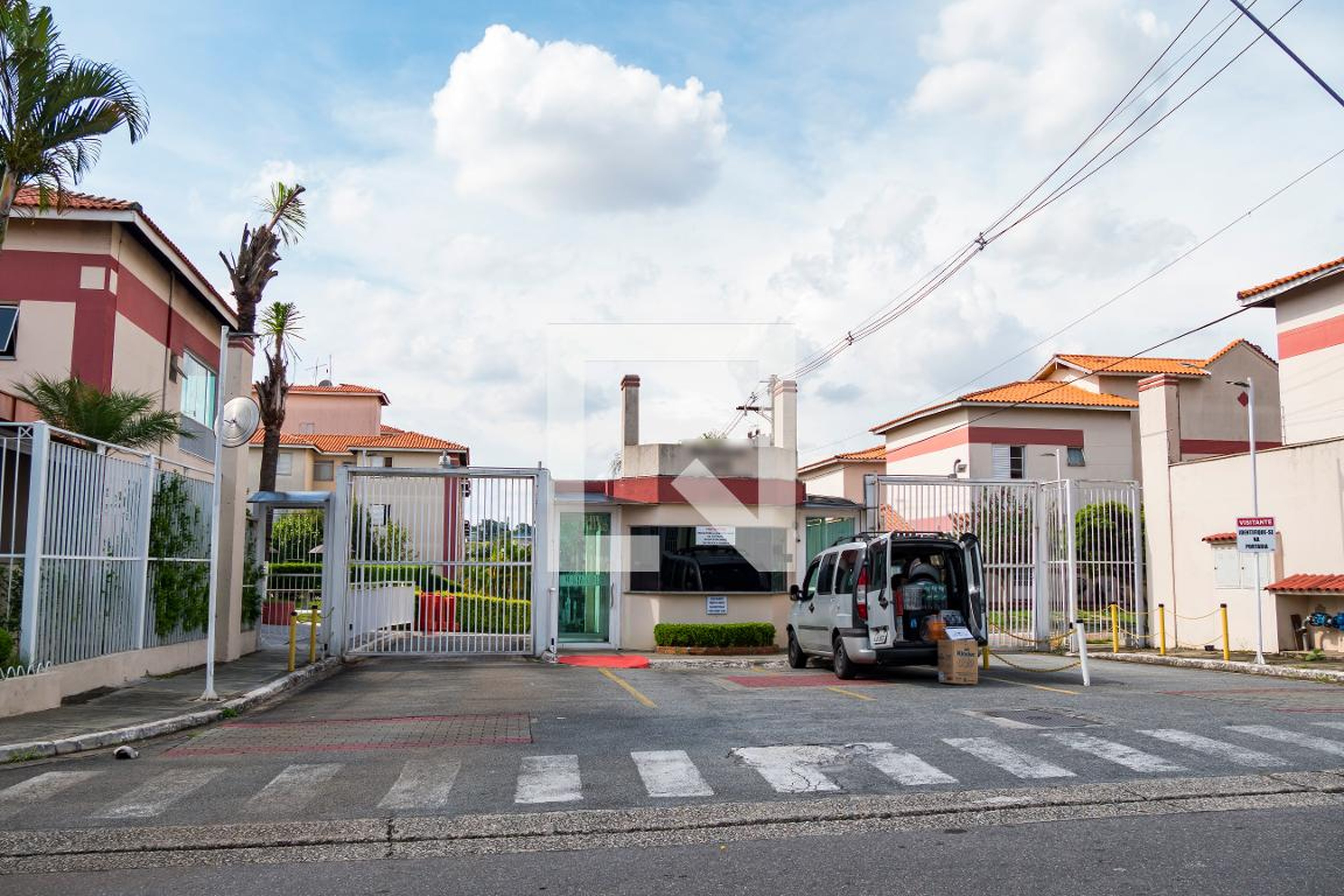 Fachada do Condomínio Condomínio Ipê