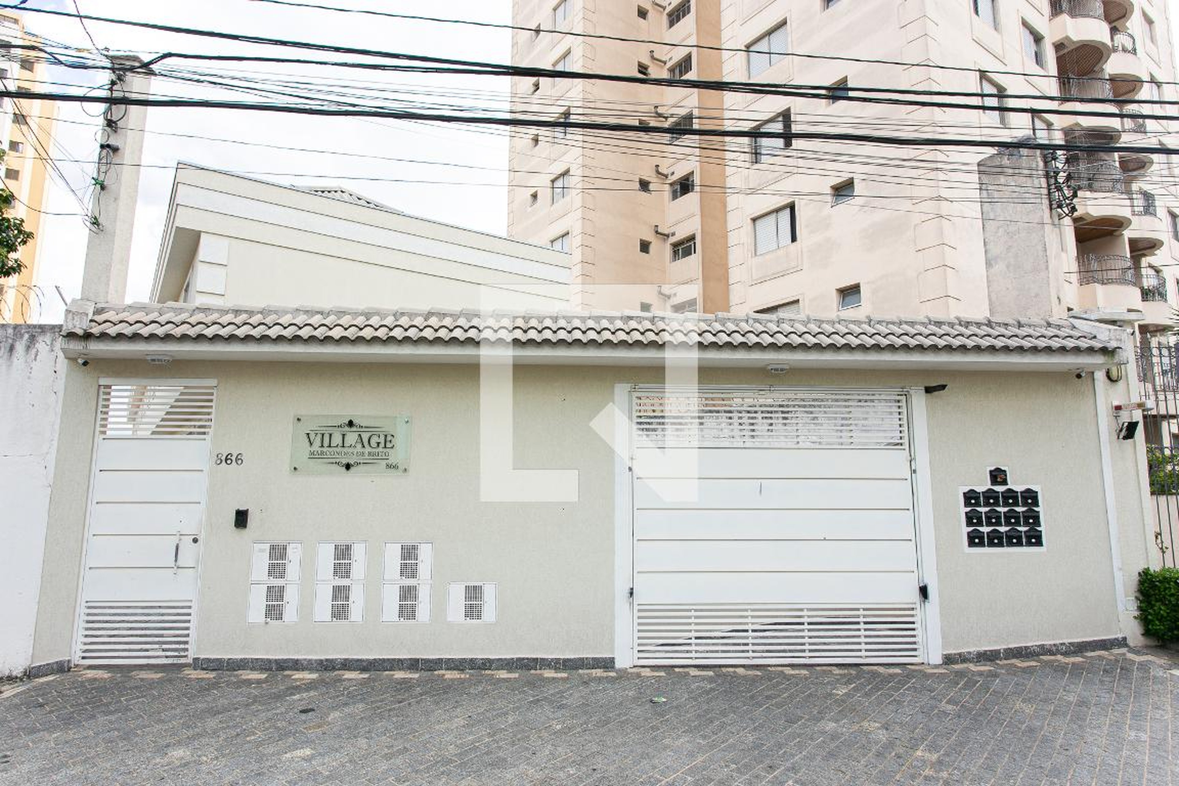 Fachada do Condomínio Condomínio Marcondes de Brito Village