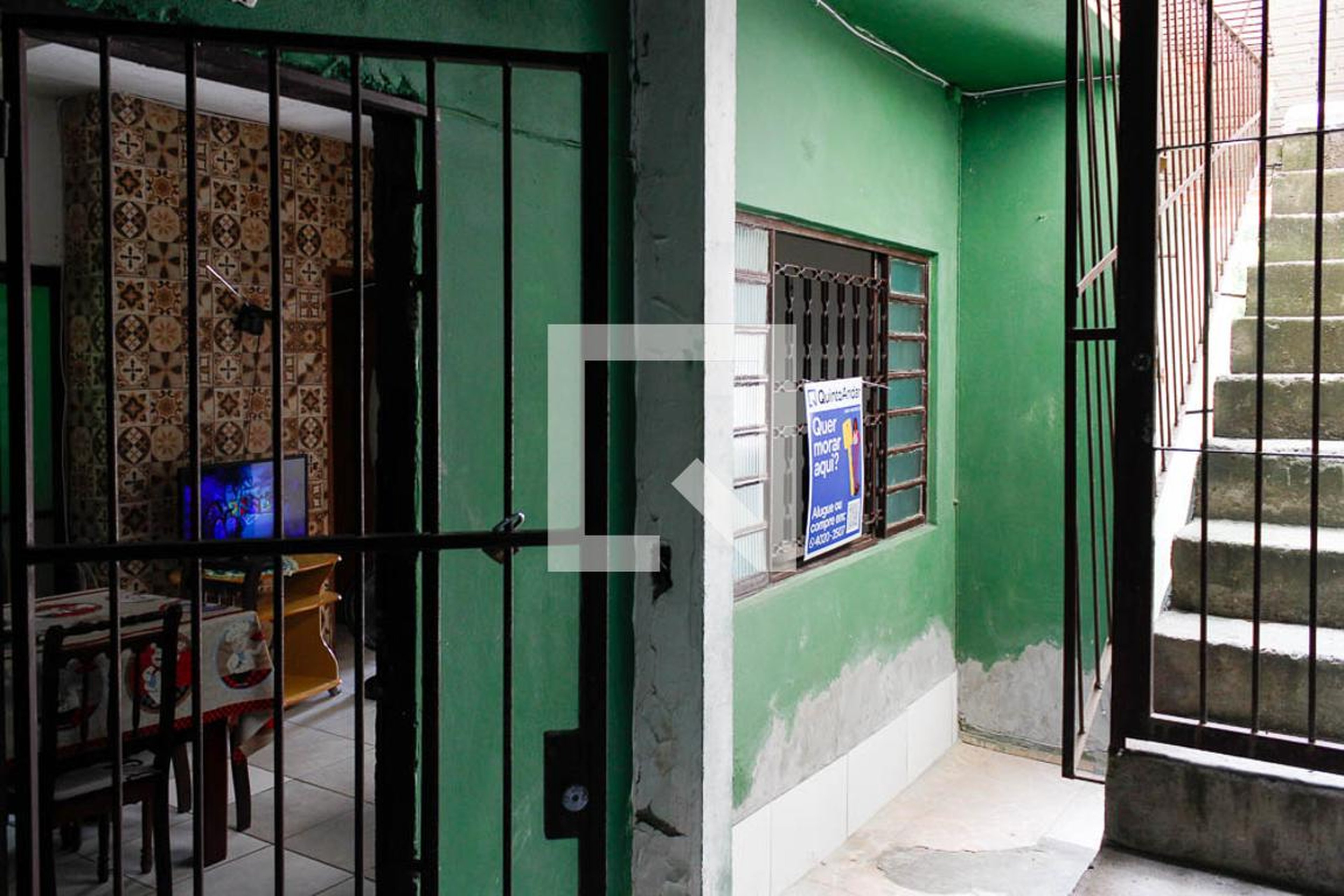 Entrada Condomínio em Rua Podalírio João da Rocha, 196
