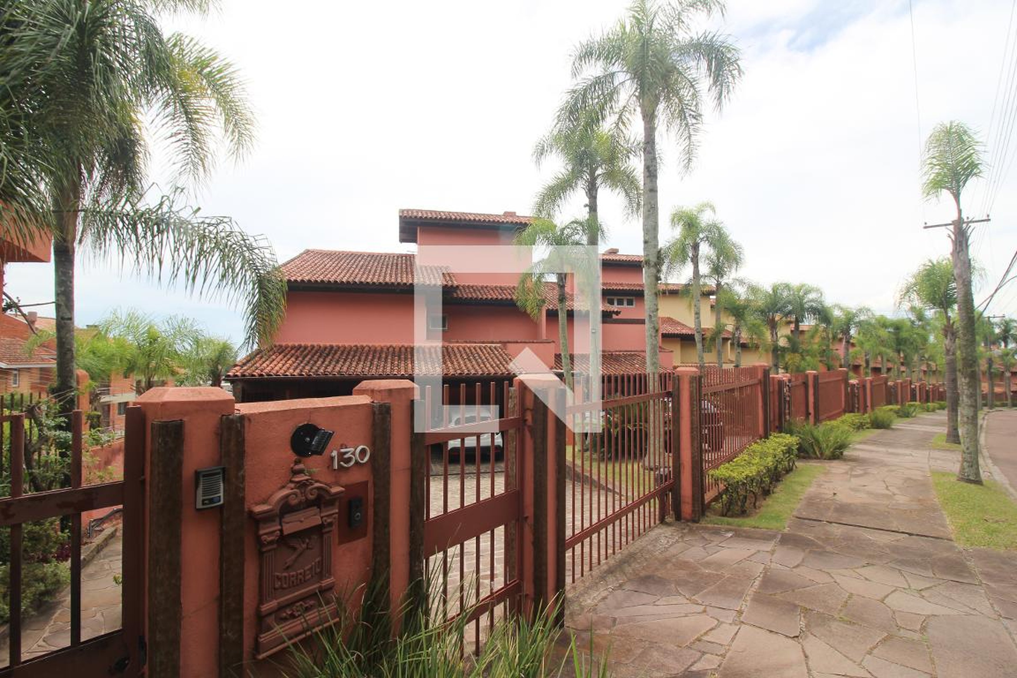 Fachada do Condomínio Condomínio Conjunto Residencial Puerto Escondido