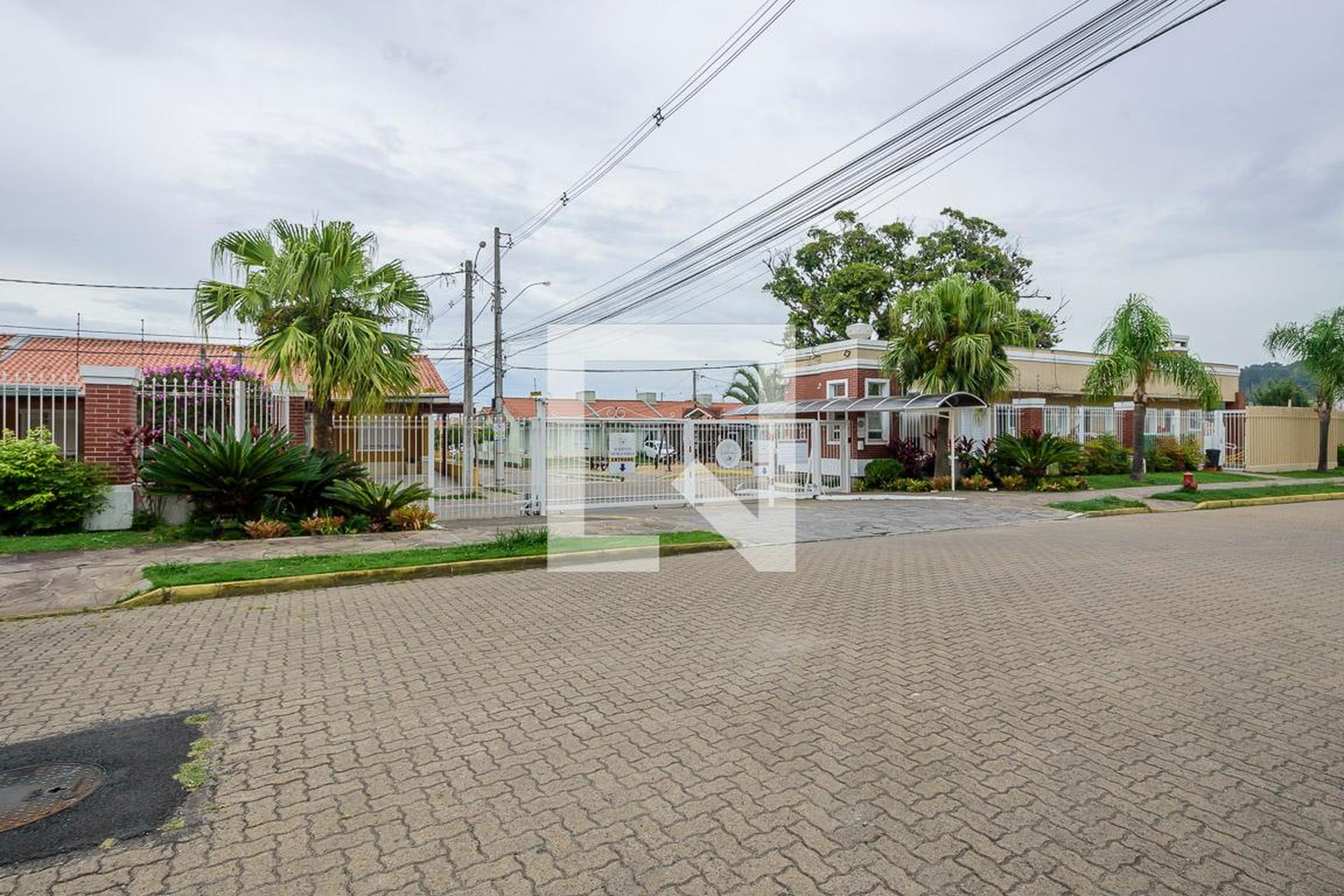 Fachada do Condomínio Condomínio Villa Carrara