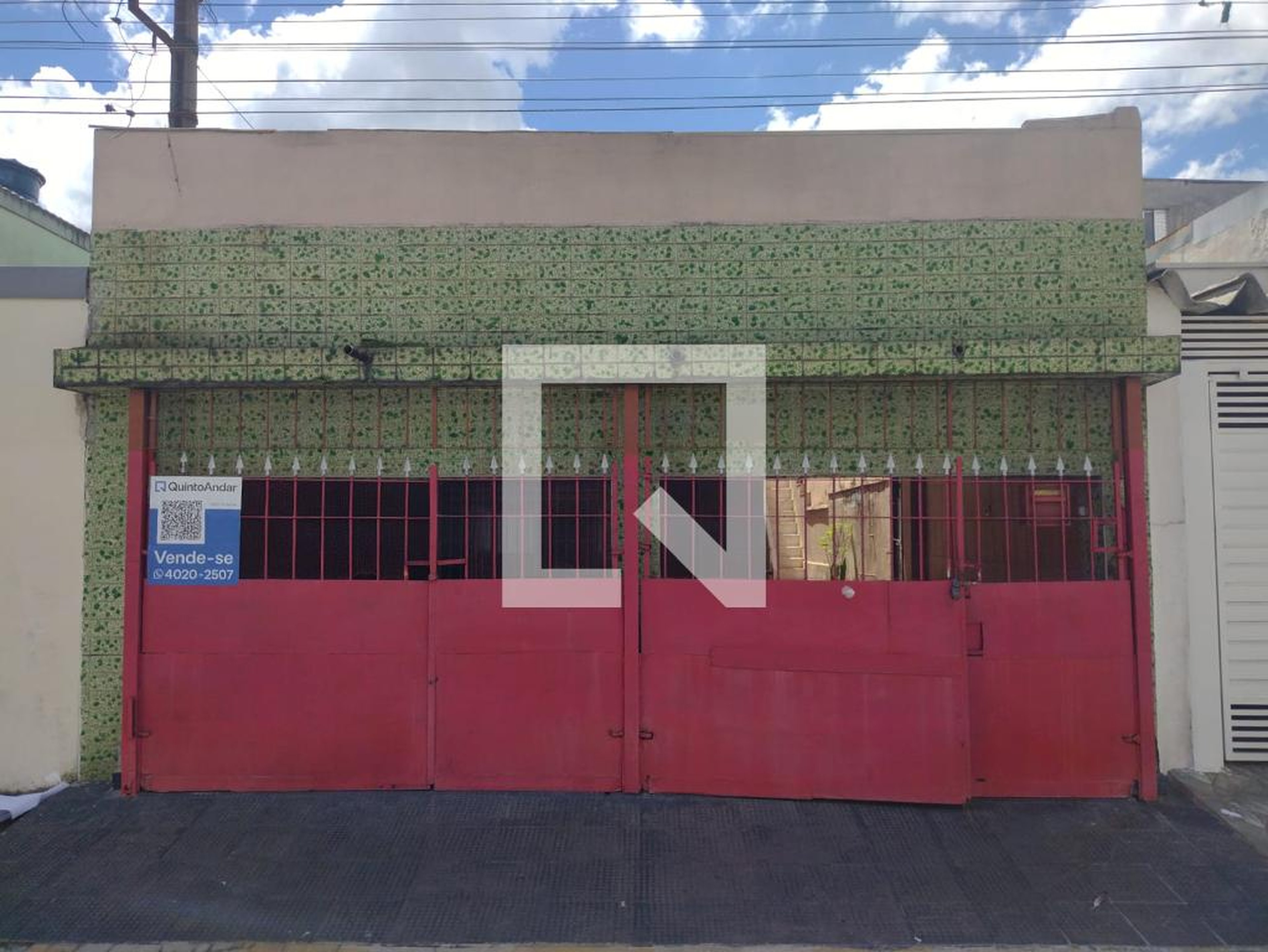 Fachada Condomínio em Rua Carlos Rodrigues de Barros, 87