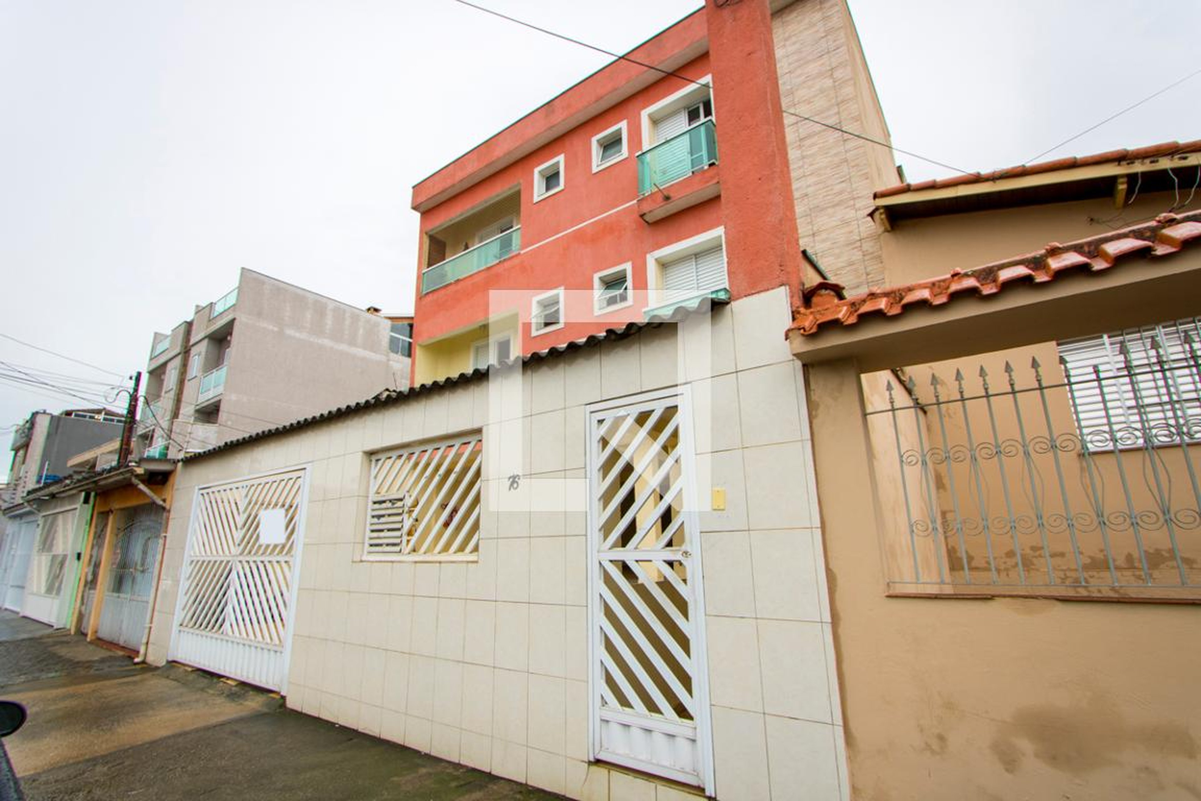 Fachada Condomínio em Rua Caiçara, 76