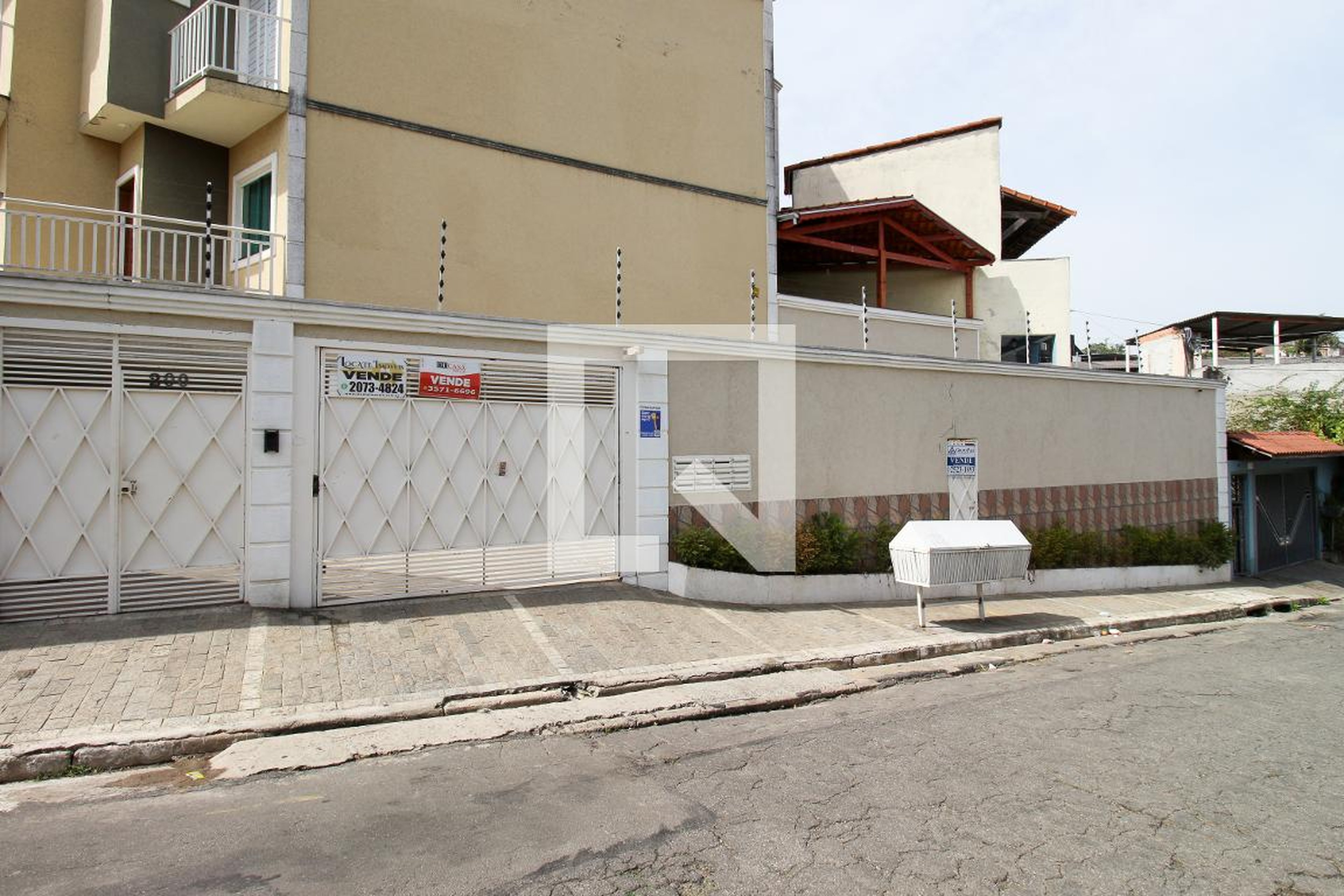 Fachada Residencial Village Amalia de Faria