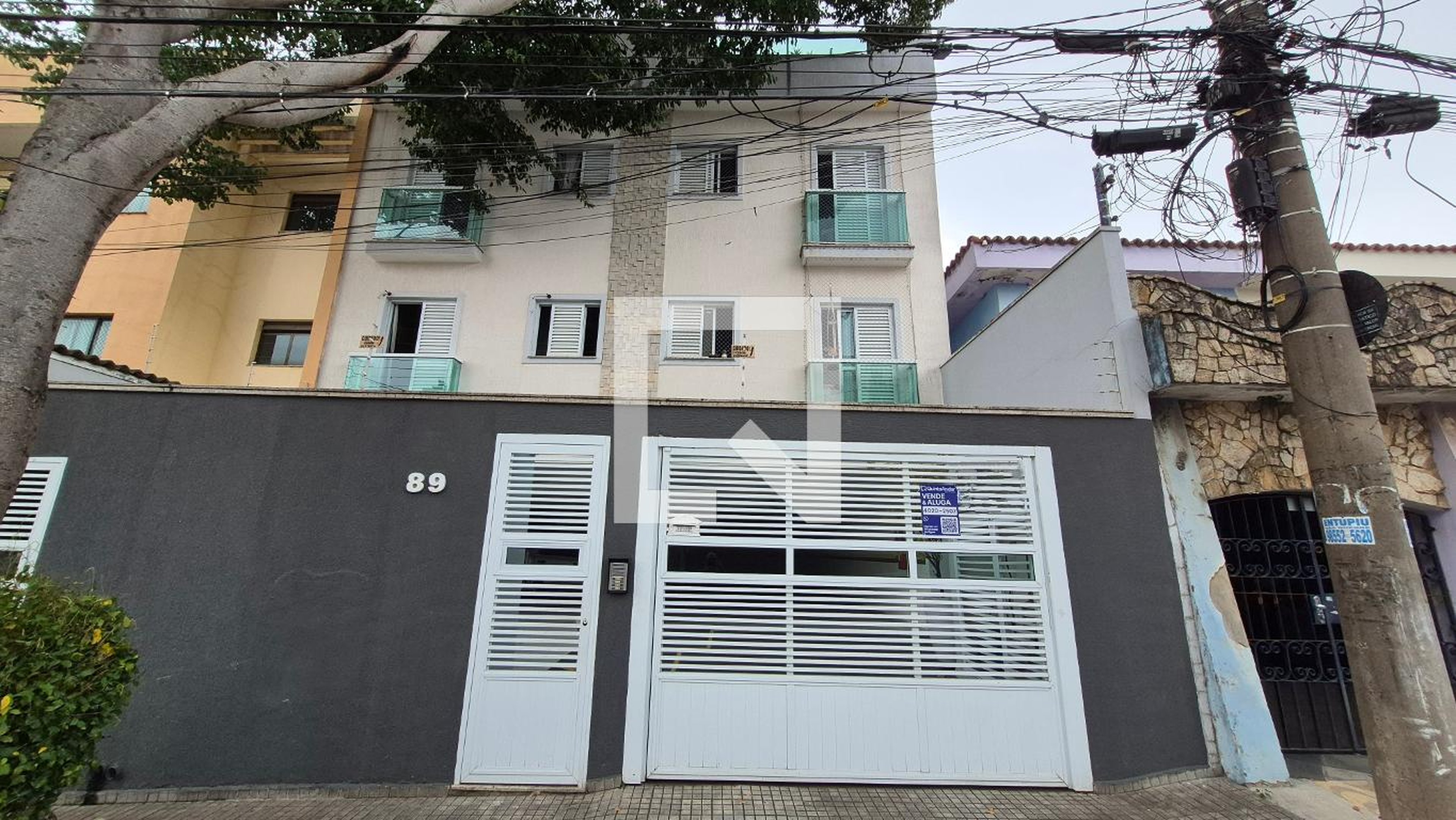 Fachada Condomínio em Rua Gonçalves Crespo, 89