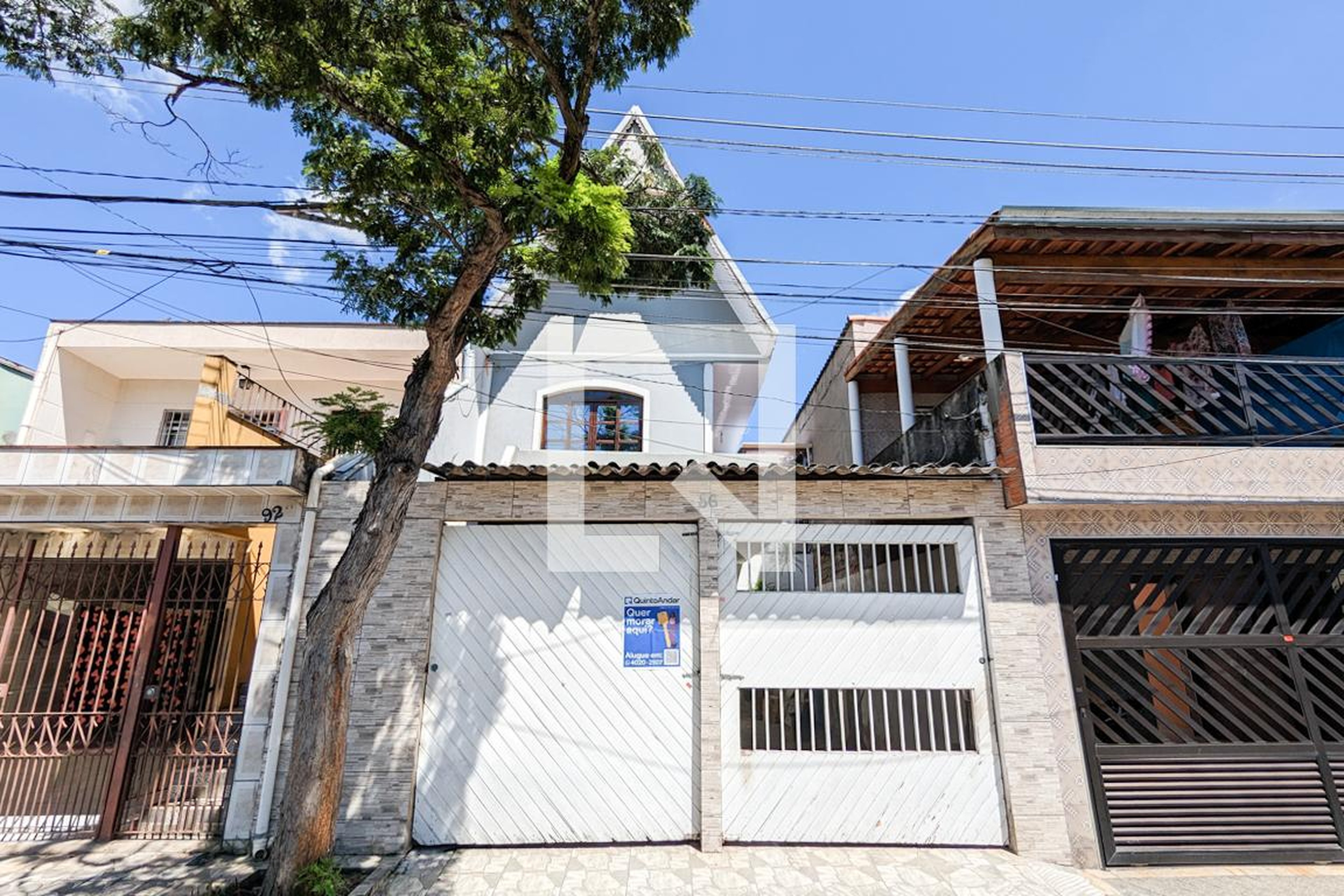 Fachada Condomínio em Rua Alfredo Dumont Vilares, 86