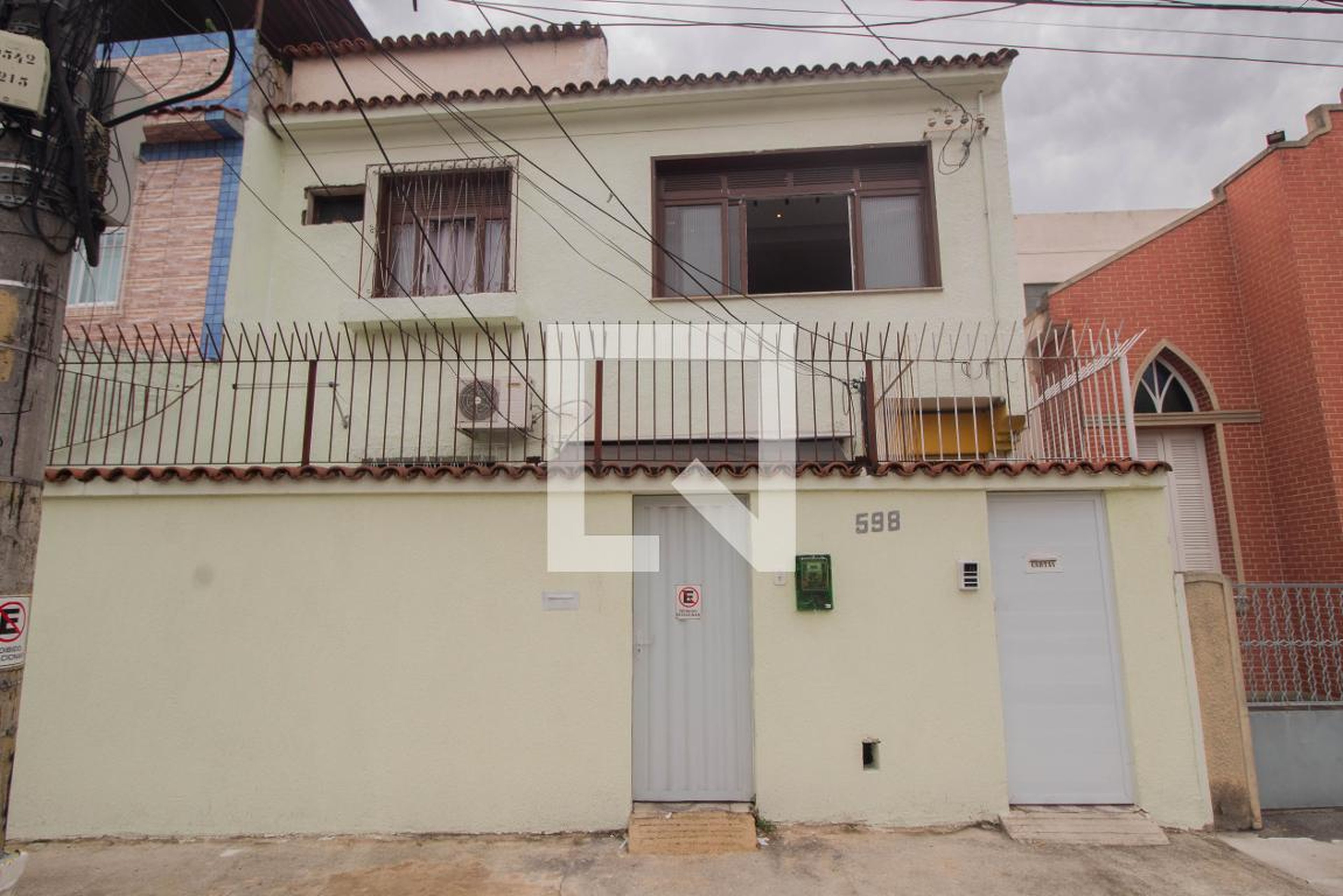 Fachada Condomínio em Rua Antonio Rego, 598