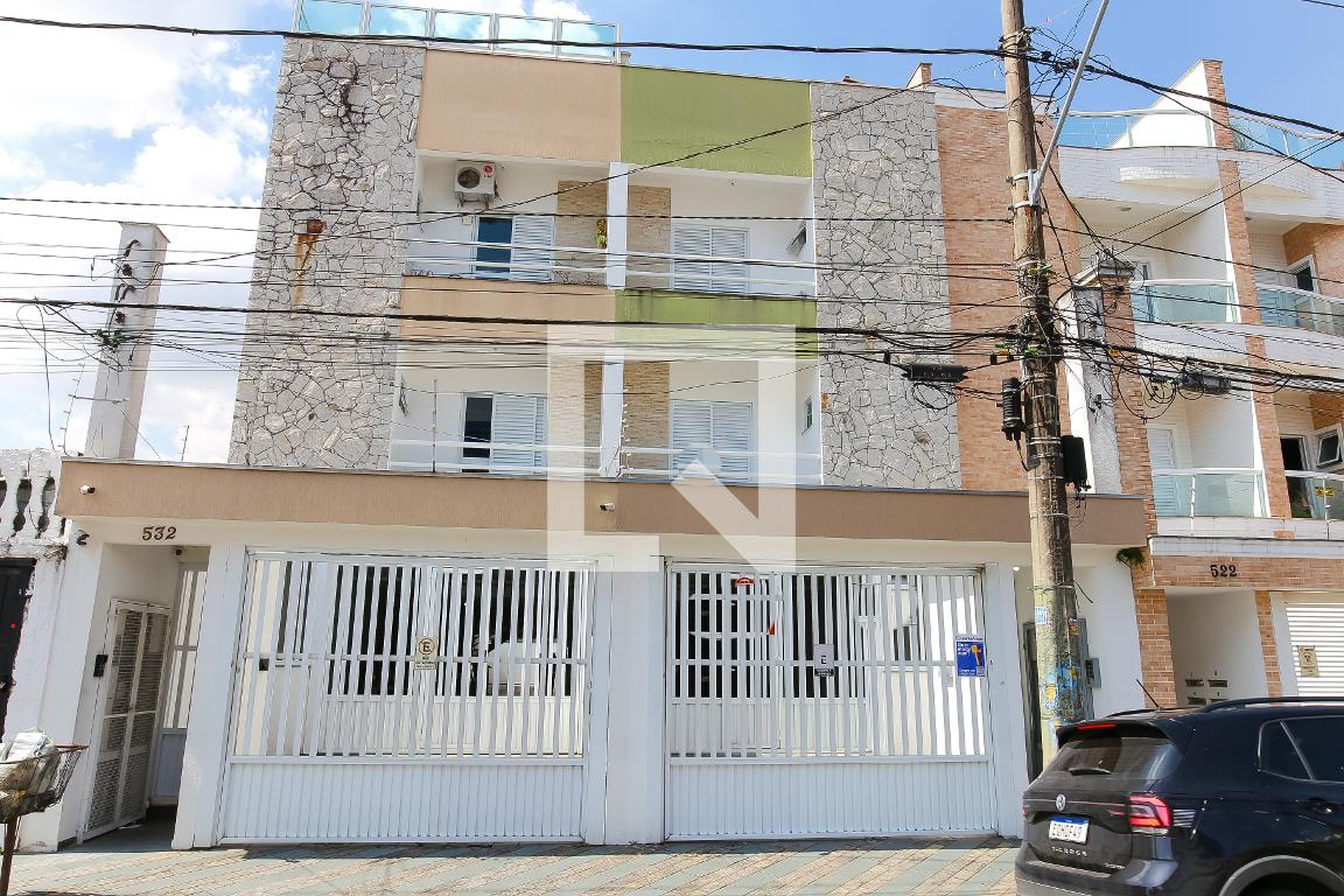 Fachada Condomínio em Rua Simão Jorge, 528