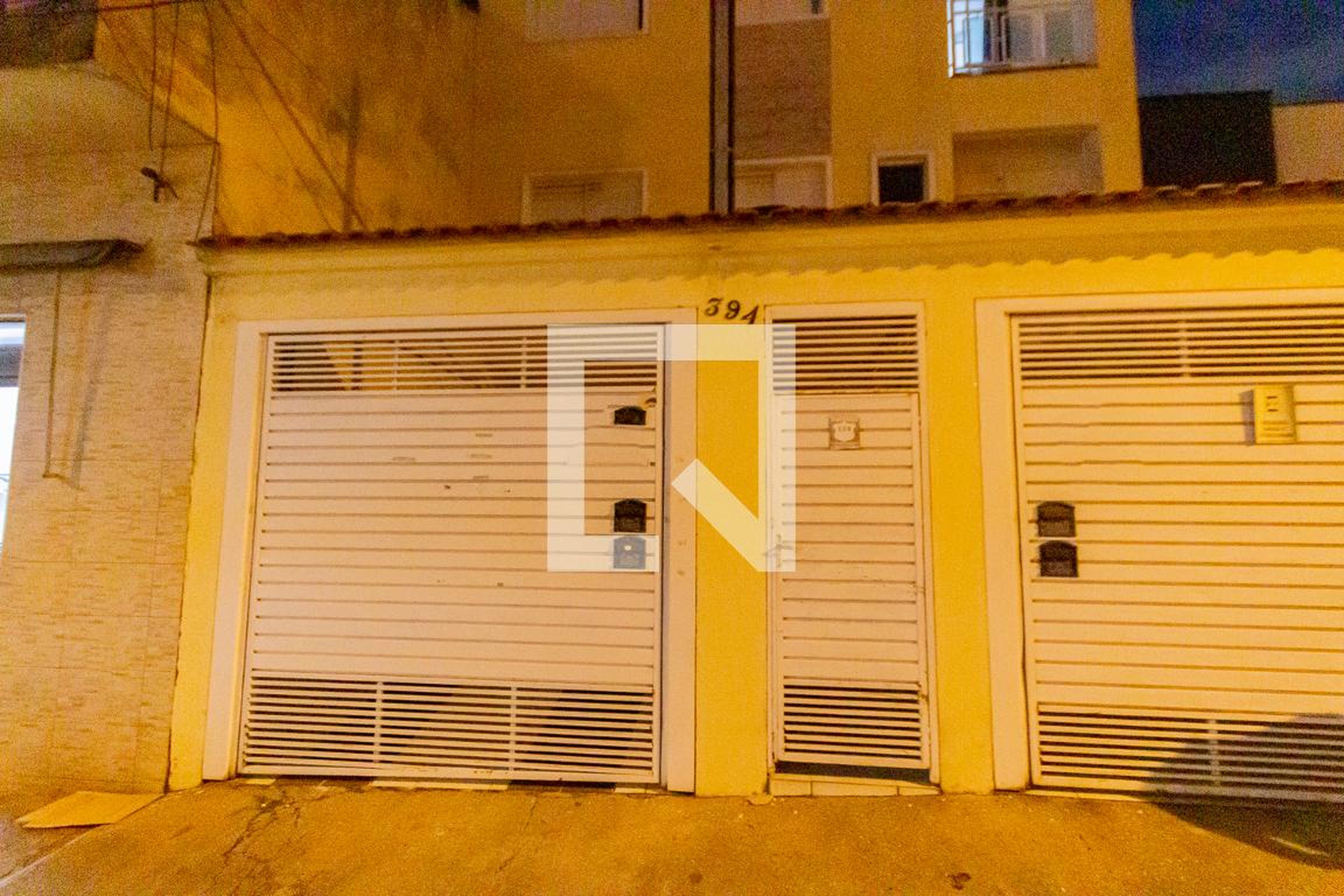 Fachada Condomínio em Rua Timor, 394