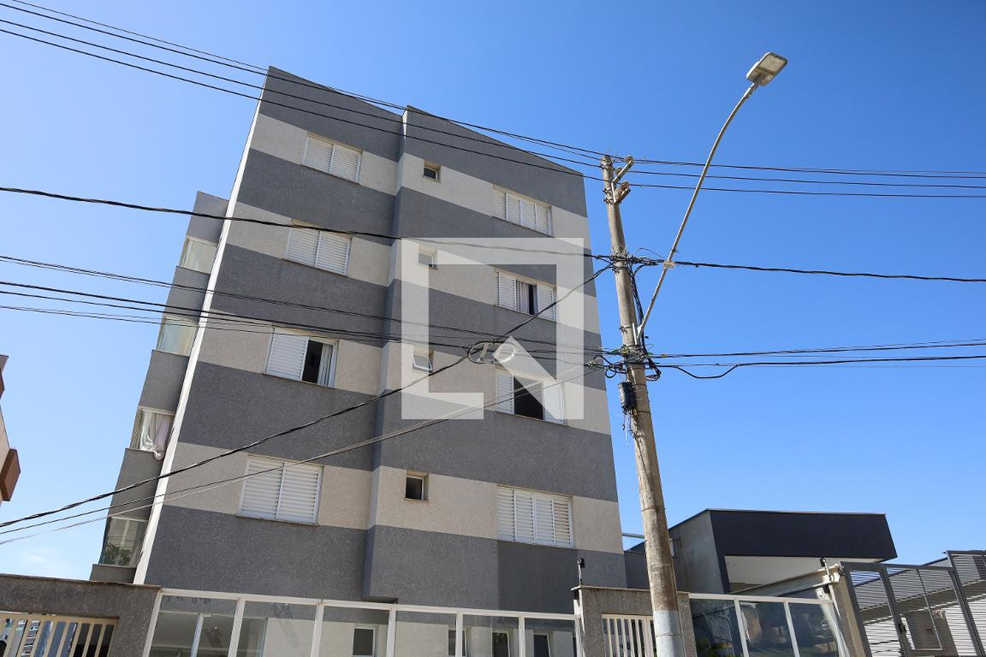 Fachada Condomínio em Rua Sílvio Menicucci, 536