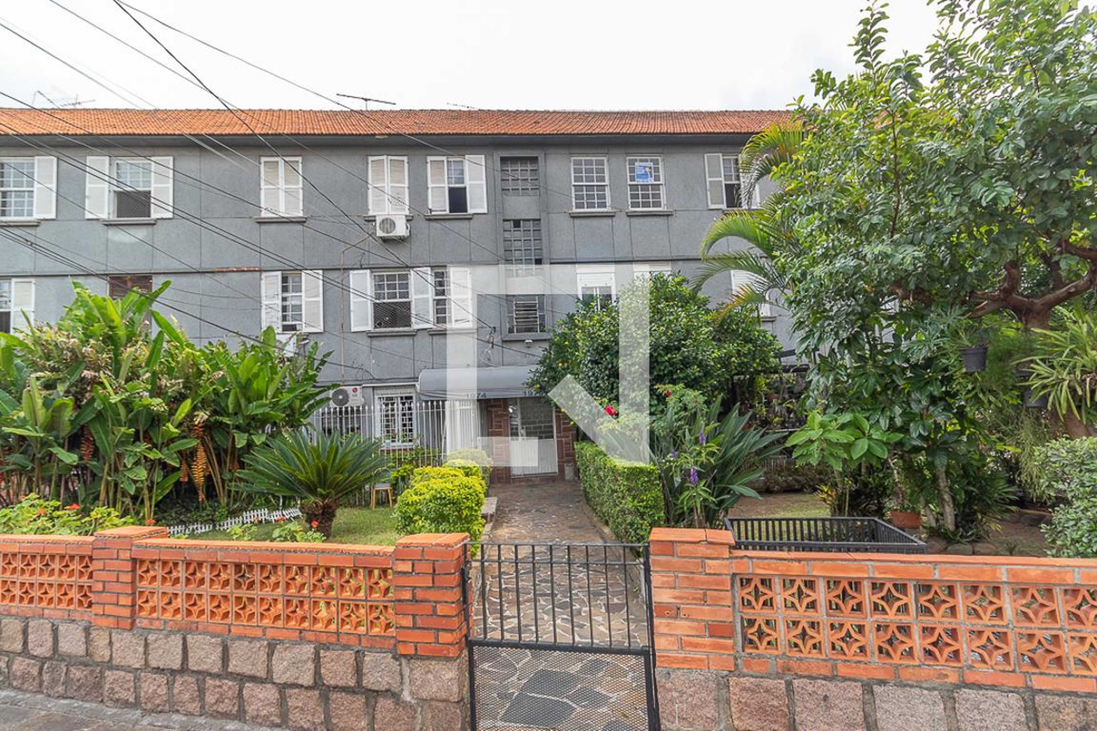 Fachada Condomínio em Avenida Plínio Brasil Milano, 1976