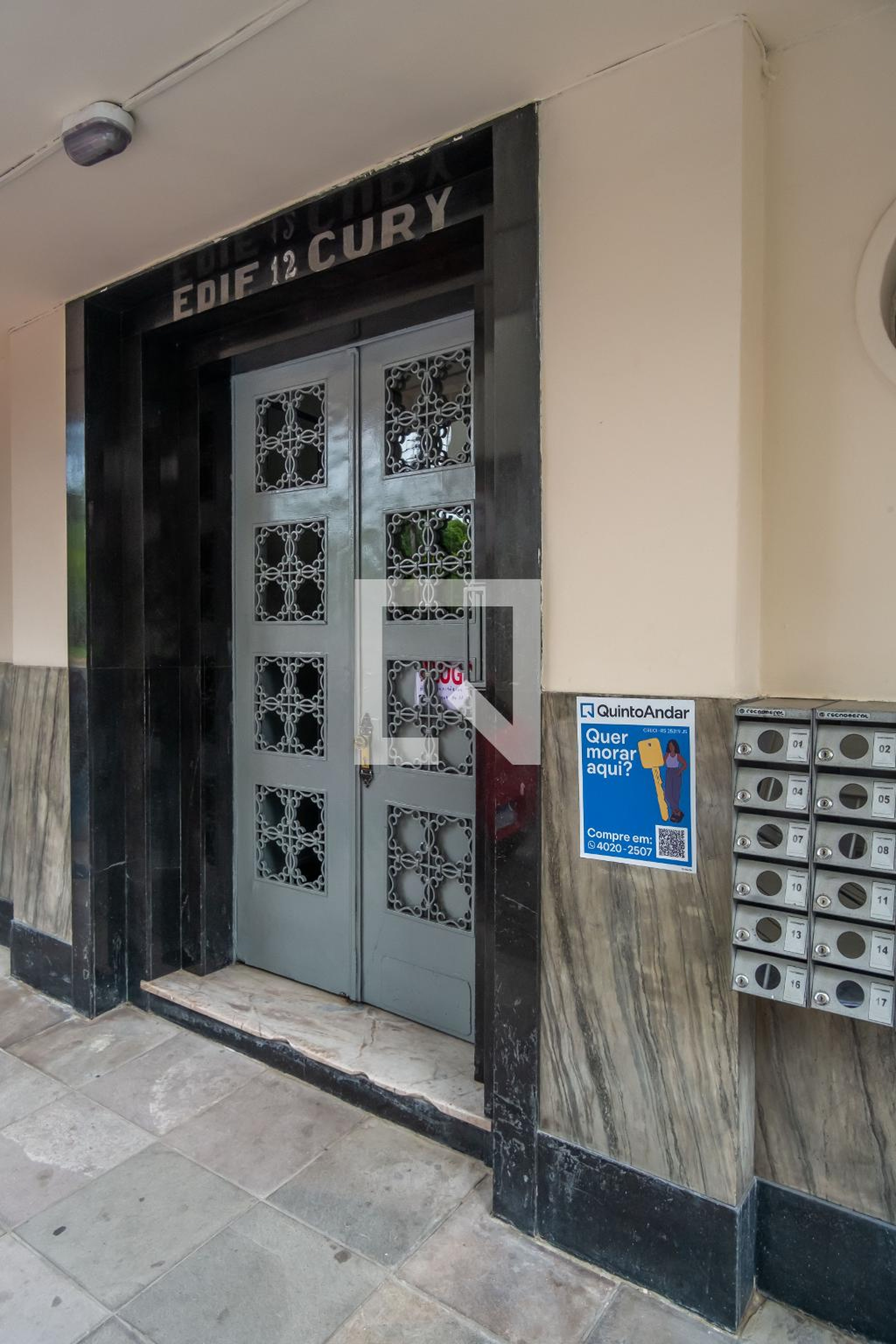 Fachada Condomínio em Rua Octávio Corrêa, 12