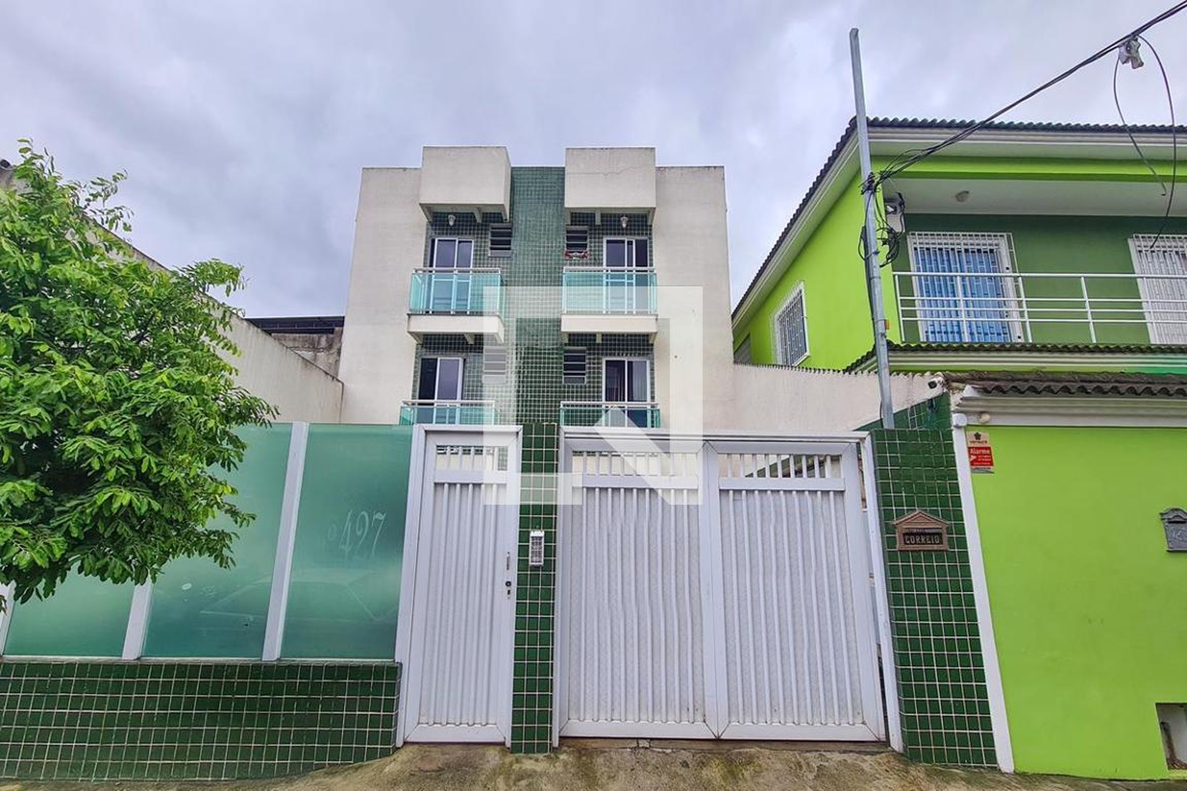 Fachada Condomínio em Rua Cerqueira Daltro, 427