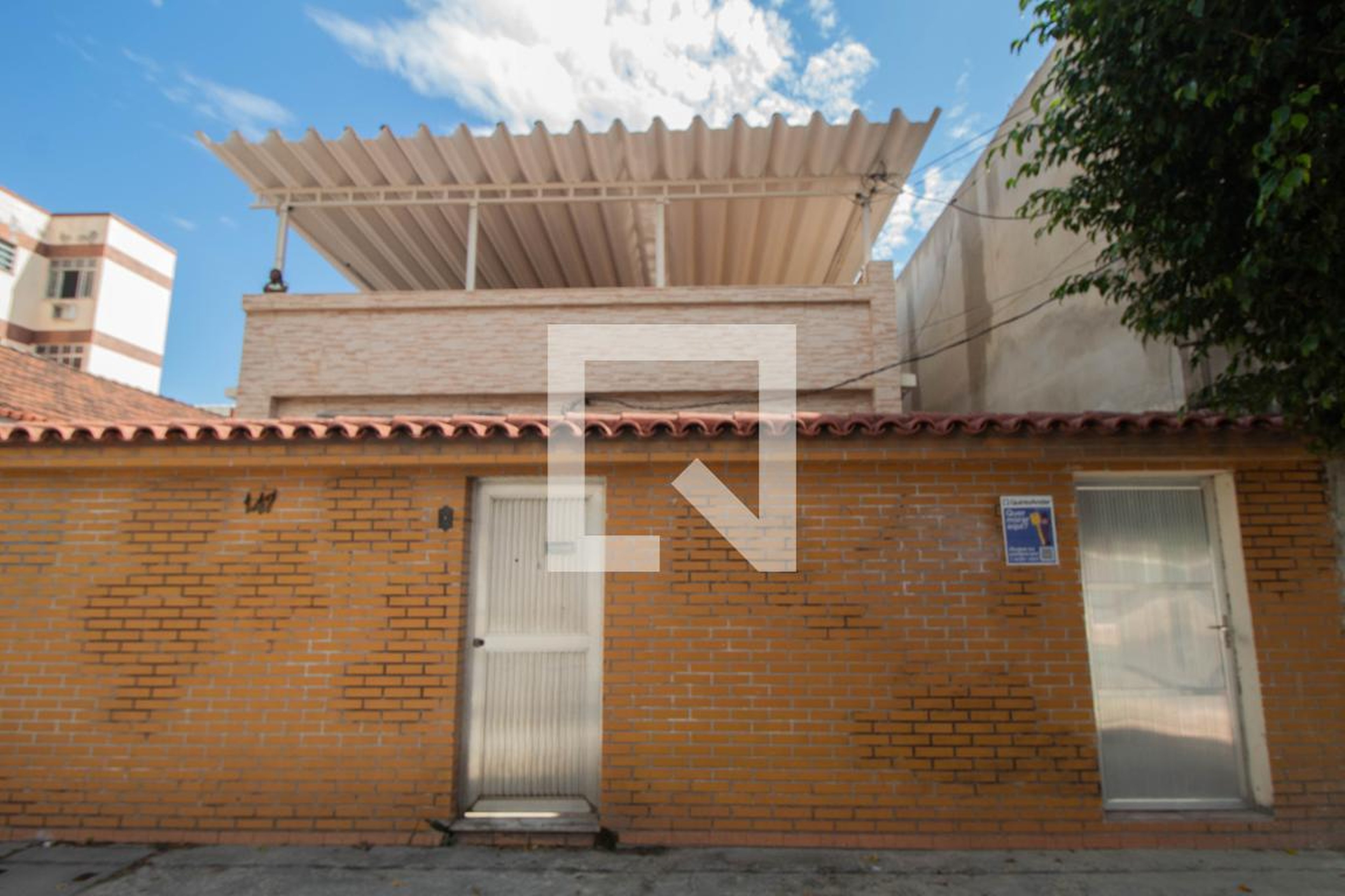 Fachada Condomínio em Rua Padre Peroneille, 147